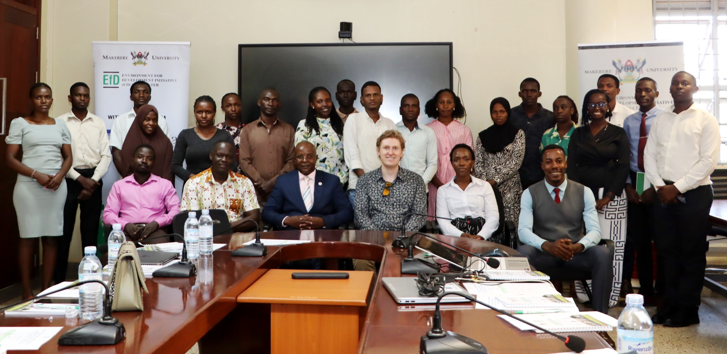 Participants in a group photo after the research seminar organised by the EfD Centre on 9th March 2026. Environment for Development (EfD) Centre research seminar by UK-based Duke University Postdoctoral Scholar Dr. Danny Tobin's study titled, “Guiding Private Afforestation to raise public-Goods Provision : Exploring Farmers preferences for trees within an NGO Tree planting program in Southern India” 9th March 2026, Yusuf Lule Central Teaching Facility, Makerere University, Kampala Uganda, East Africa.