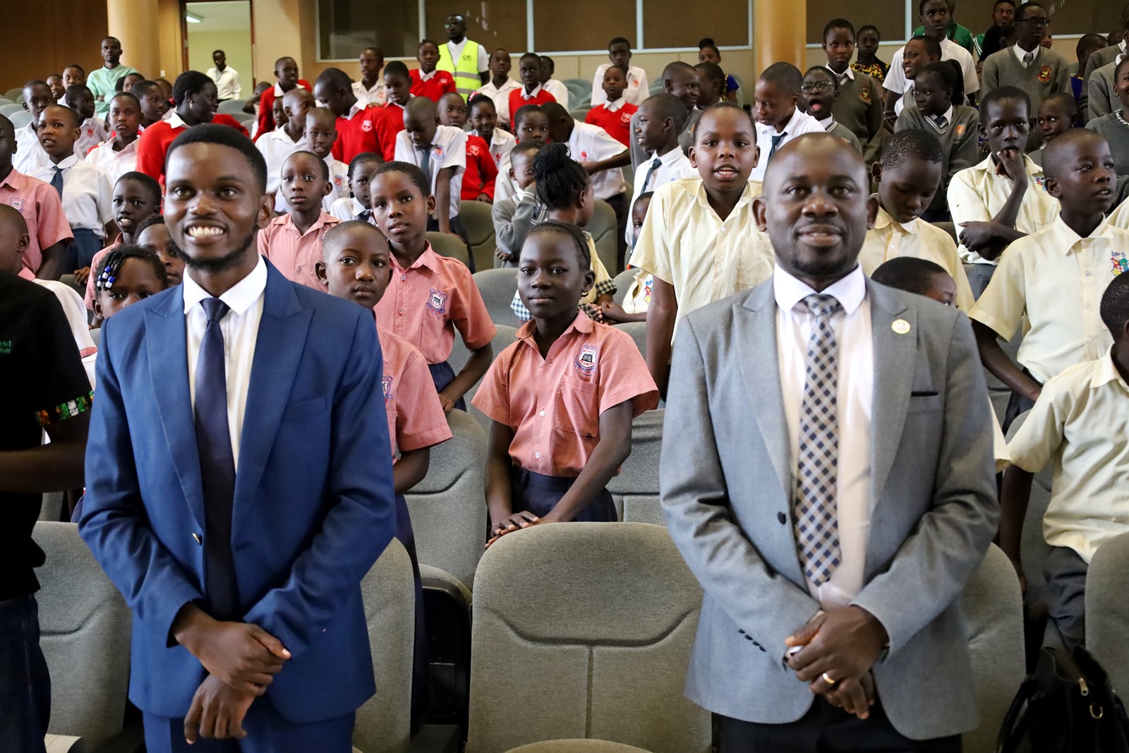 GVi Team Lead-John Robert Tenywa and Dr. Peter Babayenda during the conference. Inaugural Schools Environmental Conference organised by the Environment for Development (EfD) Uganda in partnership with the Green Vests Initiative, the National Environment Management Authority (NEMA), and the Kampala Capital City Authority (KCCA), theme “Strengthening Environmental Stewardship in Schools”, 20th March 2026, Yusuf Lule Central Teaching Facility Auditorium, Makerere University, Kampala Uganda, East Africa.