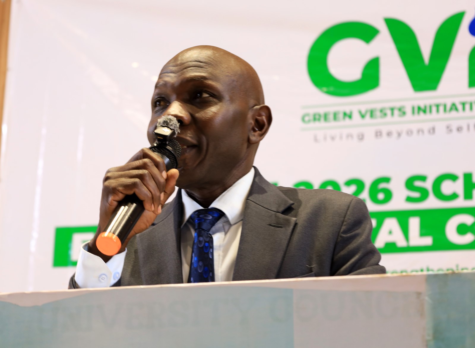 NEMAs representaitive Ikalai Wilber making his remarks. Inaugural Schools Environmental Conference organised by the Environment for Development (EfD) Uganda in partnership with the Green Vests Initiative, the National Environment Management Authority (NEMA), and the Kampala Capital City Authority (KCCA), theme “Strengthening Environmental Stewardship in Schools”, 20th March 2026, Yusuf Lule Central Teaching Facility Auditorium, Makerere University, Kampala Uganda, East Africa.