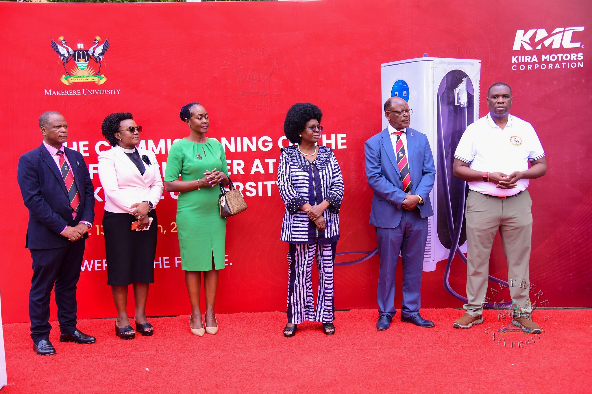 Hon. Dr. Musenero (3rd R) with R-L: Eng. Paul Isaac Musasizi, Prof. Barnabas Nawangwe, Dr. Winifred Kabumbuli, Rev. Dr. Lydia Nsaale Kitayimbwa and Prof. Moses Musinguzi. Hon. Dr. Monica Musenero commissions first DC Electric C6-180 Fast-Charging Station installed in collaboration with Kiira Motors Corporation (KMC), Senate Building Parking Lot, Makerere University, Kampala Uganda, East Africa on Friday 13th March 2026.