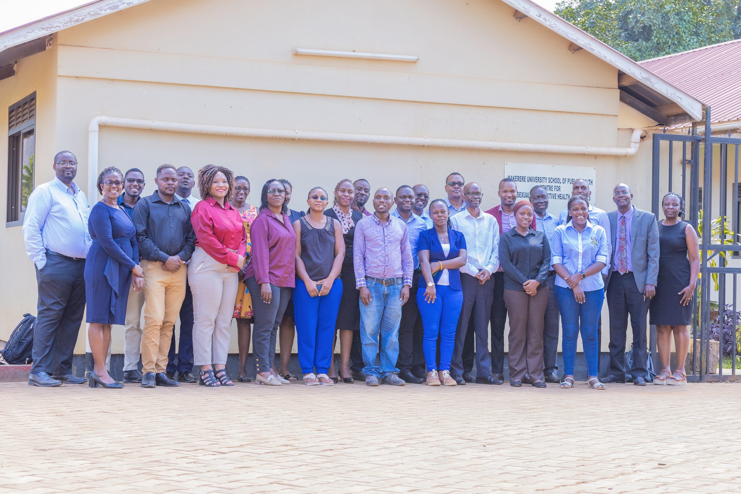 Department of Community Health and Behavioural Sciences staff pose for a photo during a meeting at our training site in Kasangati in 2025. Prof. Christopher Garimoi Orach, second right, who led the Department from 2010 to 2019, stands alongside colleagues under the current leadership of Head of Department Assoc. Prof. Christine Nalwadda. Makerere University School of Public Health Communications Office, Graduation Profiles Series, 76th Graduation Ceremony, Dr. Henry Komakech, “Effects of the Repatriation of Refugees on the Health Services of the Host Populations in the West Nile Districts of Arua, Moyo, and Adjumani,” Kampala Uganda, East Africa.