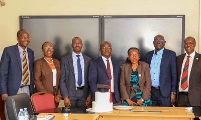 At the centre, Henry Komakech stands next to his Opponent, Prof. Stella Neema, celebrating the successful defence of his doctoral thesis, alongside members of his examining team: External Examiner Dr. Stephen Langole, Internal Examiner Dr. Aloysius Ssennyonjo and Supervisors Prof. Christopher Garimoi Orach and Dr. Lynn M. Atuyambe, and Doctoral Committee member Dr. Juliet Kiguli. The defence meeting was chaired by Assoc. Prof. Christine Nalwadda, Head, Department of Community Health and Behavioural Sciences, on December 19, 2025. Makerere University School of Public Health Communications Office, Graduation Profiles Series, 76th Graduation Ceremony, Dr. Henry Komakech, “Effects of the Repatriation of Refugees on the Health Services of the Host Populations in the West Nile Districts of Arua, Moyo, and Adjumani,” Kampala Uganda, East Africa.