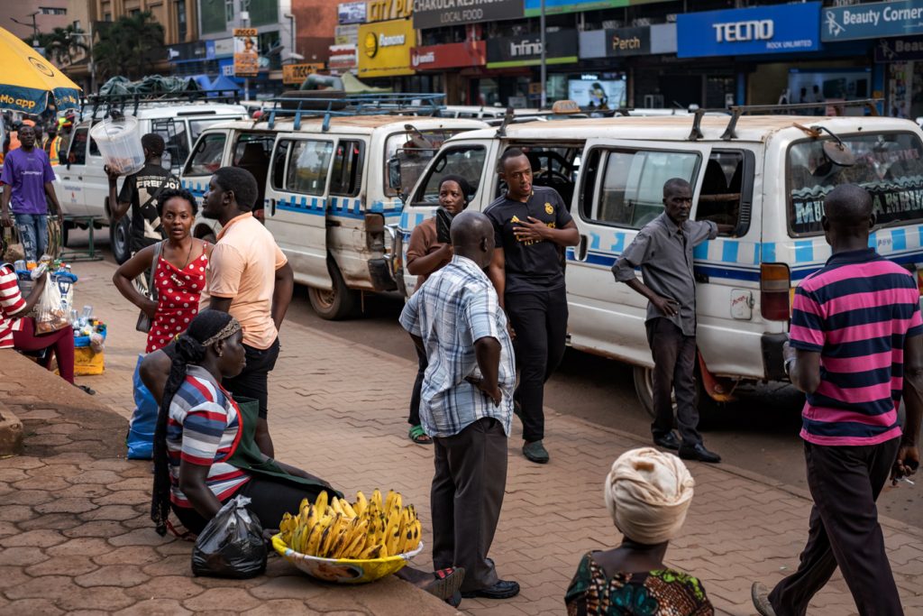 Taxi conductors marshal passengers and load commuter minibuses on a Kampala street. Photo: Katumba Badru. New study by Dr. Linda Kyomuhendo Jovia, medical doctor and Master of Public Health graduate Makerere University School of Public Health, Kampala Uganda, East Africa, cross-sectional survey of 422 drivers across Old, New, Kisenyi, Usafi, Namirembe, Nakawa, and Nateete parks, symptoms of depression (65.6%), anxiety affected more than 70%, and stress an estimated 82%, March 2026.