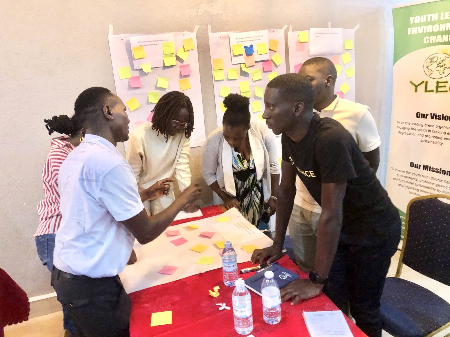 Participants deliberate during a group activity. Youth for Climate Justice (Y4CJ) project, School of Forestry, Environmental and Geographical Sciences, College of Agricultural and Environmental Sciences (CAES), Makerere University groundbreaking initiative that amplifies the voices and agency of marginalized youth in the global South and North. Mission - foster sustainable and effective climate activism among young people from diverse backgrounds, while prioritizing their well-being and social justice. Co-creation workshop, 13th March 2026, JFrigh Hotel Makerere – Kikoni, Kampala Uganda, East Africa.