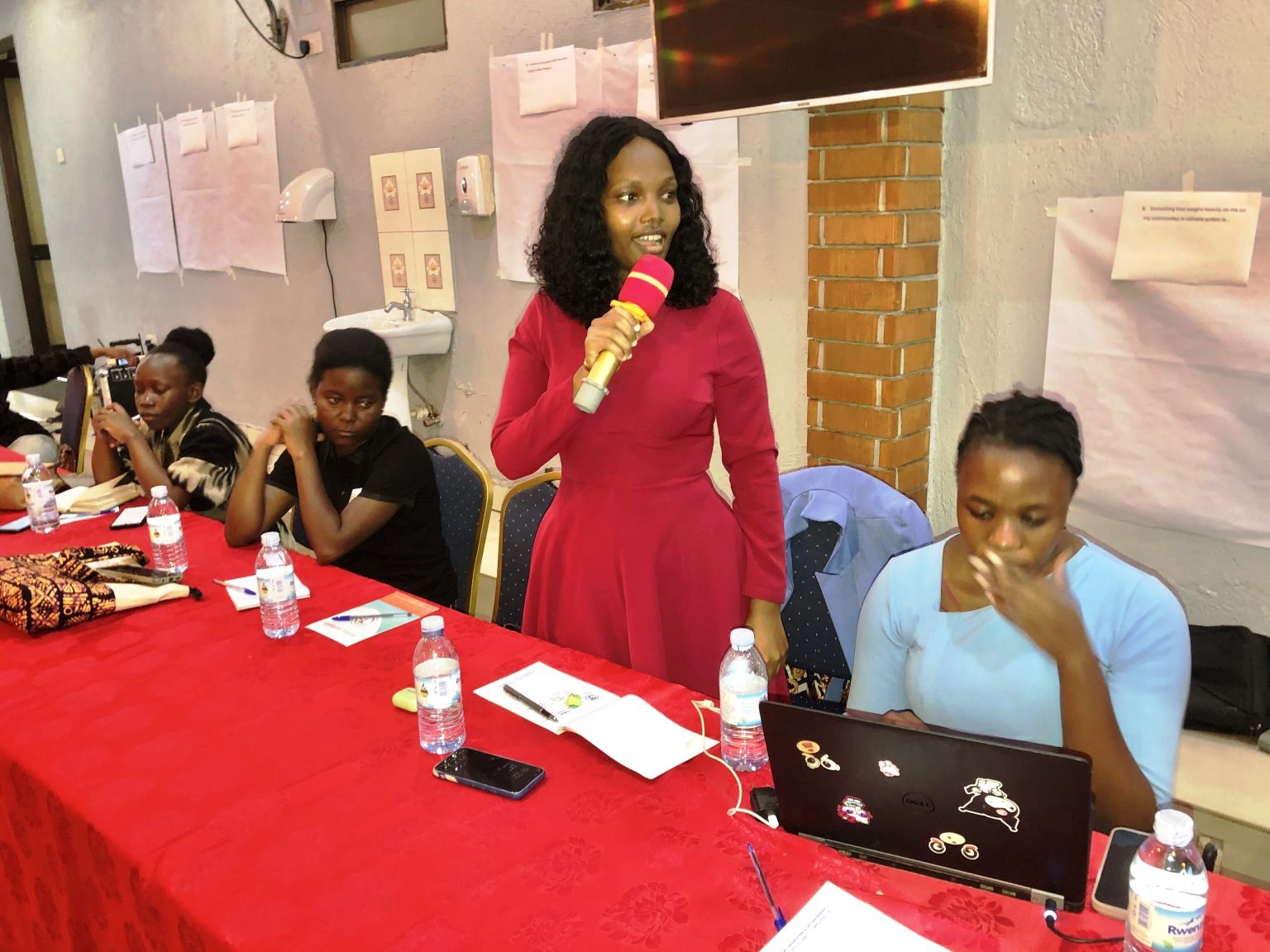 A Participant sharing her insights during a discussion. Youth for Climate Justice (Y4CJ) project, School of Forestry, Environmental and Geographical Sciences, College of Agricultural and Environmental Sciences (CAES), Makerere University groundbreaking initiative that amplifies the voices and agency of marginalized youth in the global South and North. Mission - foster sustainable and effective climate activism among young people from diverse backgrounds, while prioritizing their well-being and social justice. Co-creation workshop, 13th March 2026, JFrigh Hotel Makerere – Kikoni, Kampala Uganda, East Africa.