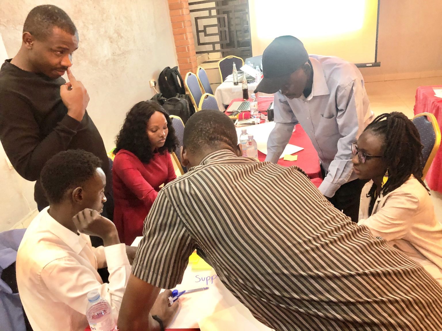 Mr. Stephen Bright Sakwa (L), another Co-Facilitator guiding participants. Youth for Climate Justice (Y4CJ) project, School of Forestry, Environmental and Geographical Sciences, College of Agricultural and Environmental Sciences (CAES), Makerere University groundbreaking initiative that amplifies the voices and agency of marginalized youth in the global South and North. Mission - foster sustainable and effective climate activism among young people from diverse backgrounds, while prioritizing their well-being and social justice. Co-creation workshop, 13th March 2026, JFrigh Hotel Makerere – Kikoni, Kampala Uganda, East Africa.