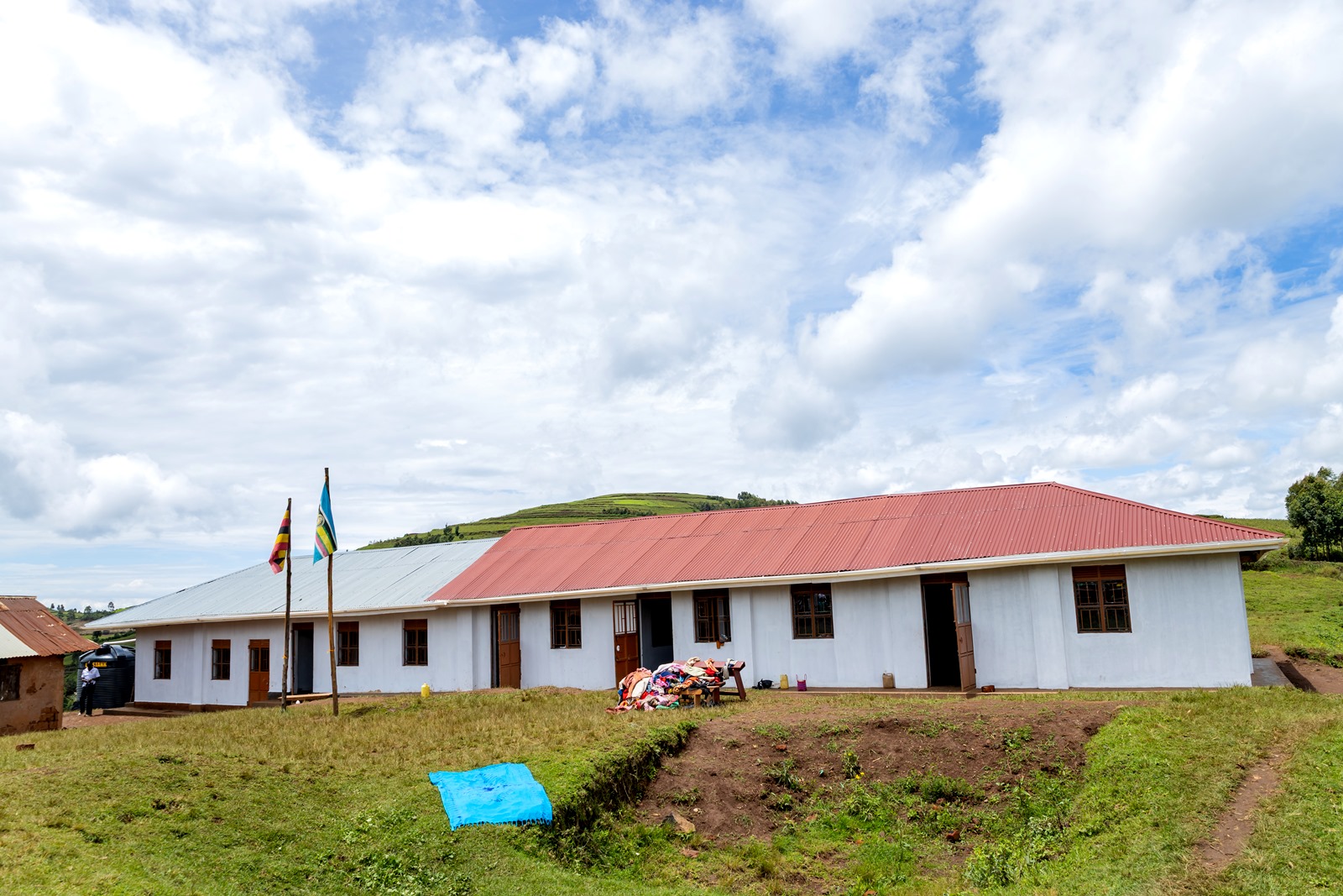 The five-classroom block at Bwera Primary School. Mastercard Foundation Scholars Program at Makerere University Giveback, in partnership with dfcu Bank, handover five-classroom block equipped with 60 bench desks, four-stance modern pit latrine, and a 10,000-litre rainwater harvesting system on 1st April 2026 to Bwera Primary School in Kabale District, Uganda, East Africa.