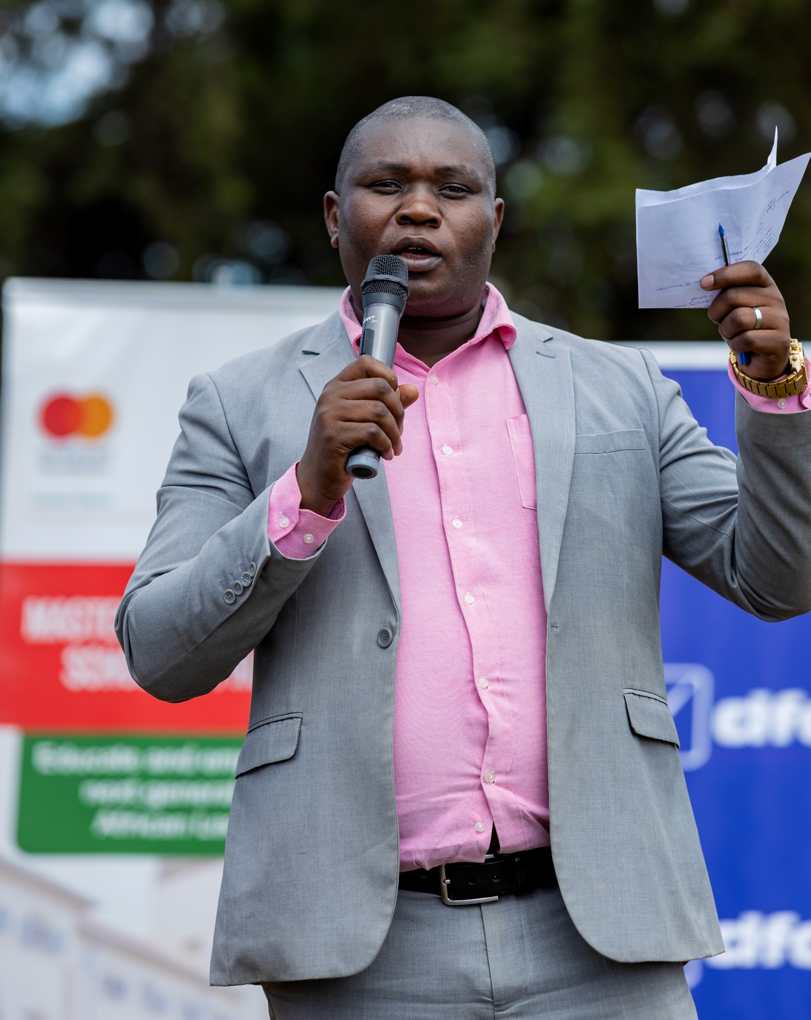Mr. Moses Tumwijukye Bwengye. Mastercard Foundation Scholars Program at Makerere University Giveback, in partnership with dfcu Bank, handover five-classroom block equipped with 60 bench desks, four-stance modern pit latrine, and a 10,000-litre rainwater harvesting system on 1st April 2026 to Bwera Primary School in Kabale District, Uganda, East Africa.
