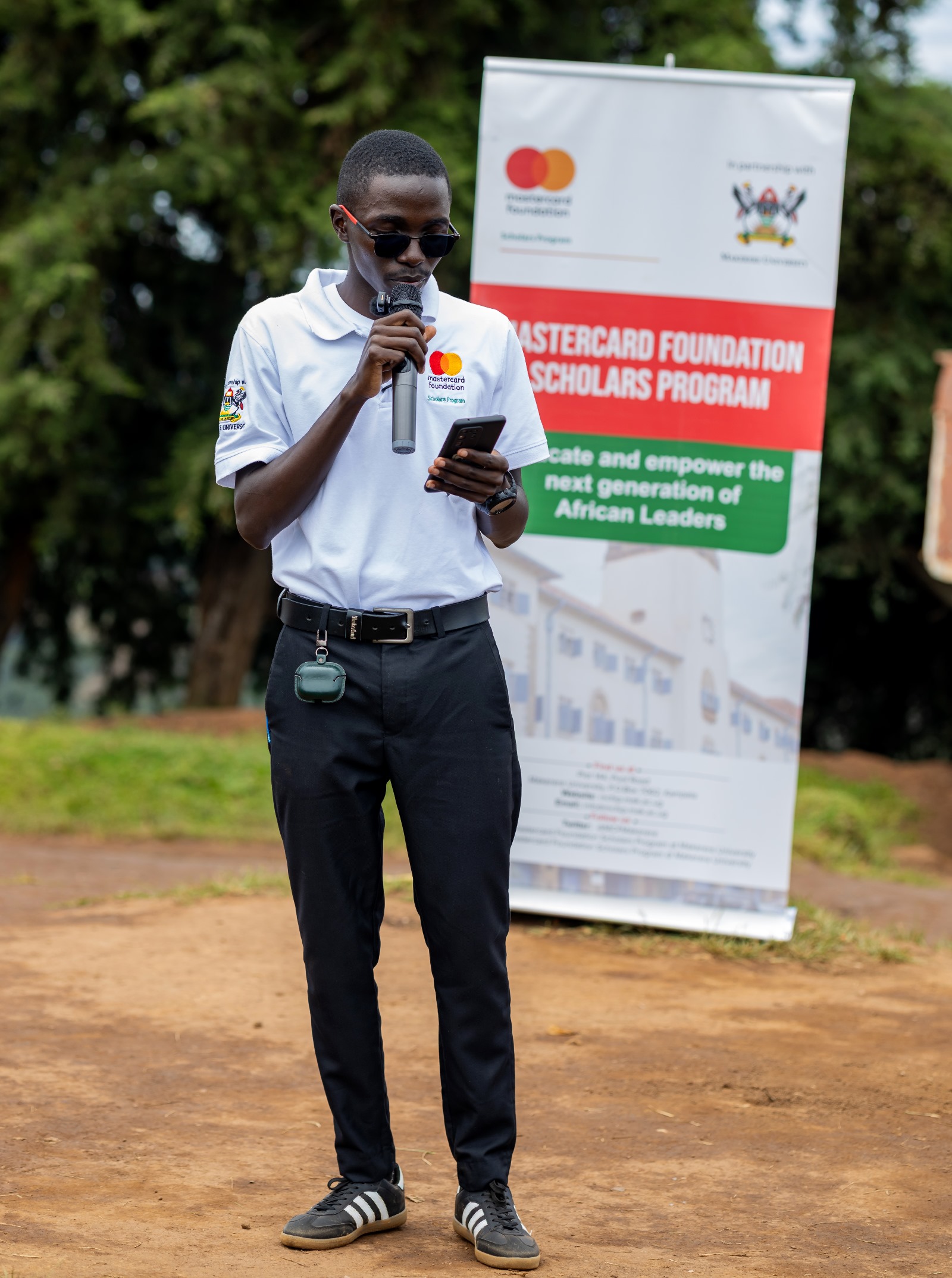 Mr. Nelson Dumba. Mastercard Foundation Scholars Program at Makerere University Giveback, in partnership with dfcu Bank, handover five-classroom block equipped with 60 bench desks, four-stance modern pit latrine, and a 10,000-litre rainwater harvesting system on 1st April 2026 to Bwera Primary School in Kabale District, Uganda, East Africa.