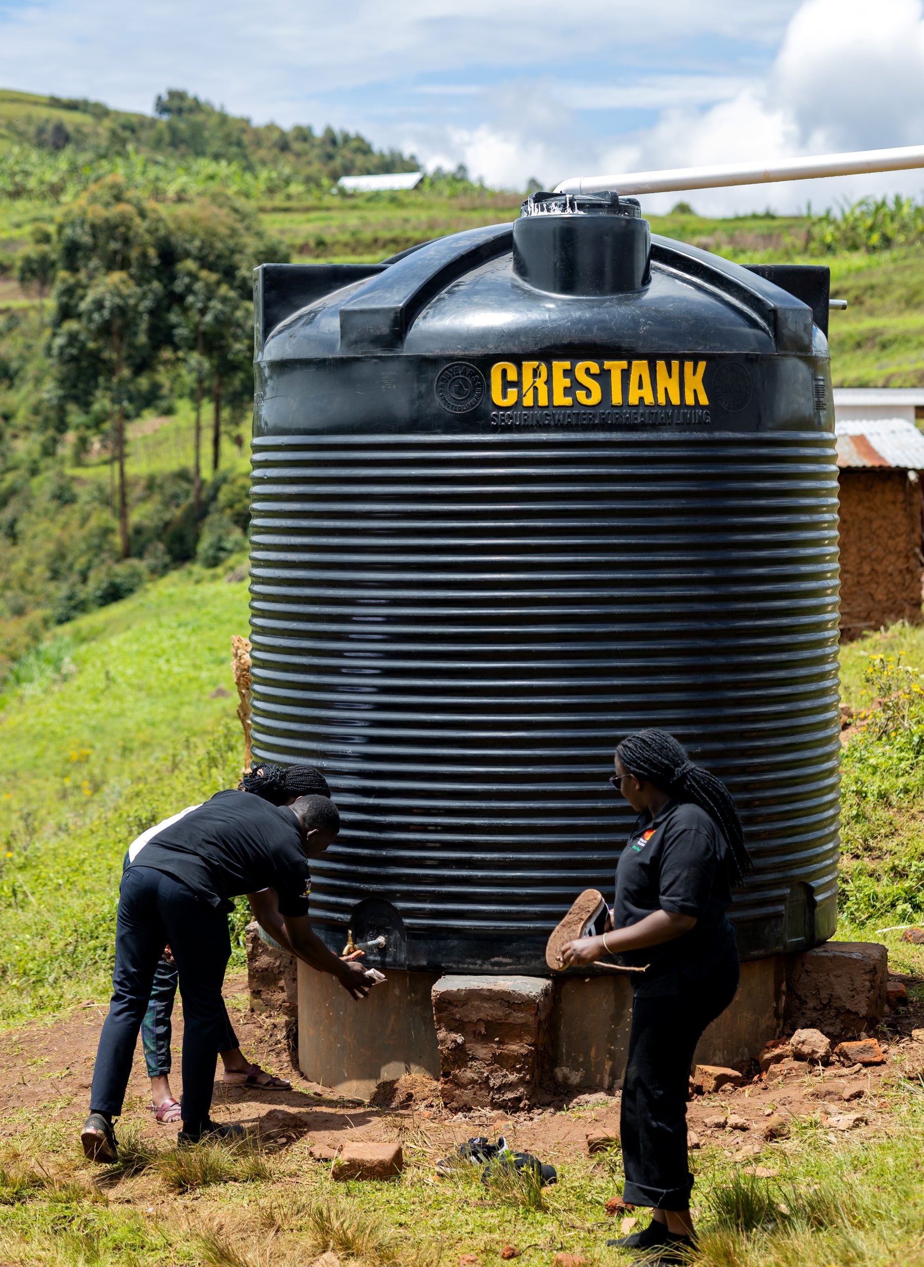 The 10,000-litre water tank, an integral part of the rainwater harvesting system. Mastercard Foundation Scholars Program at Makerere University Giveback, in partnership with dfcu Bank, handover five-classroom block equipped with 60 bench desks, four-stance modern pit latrine, and a 10,000-litre rainwater harvesting system on 1st April 2026 to Bwera Primary School in Kabale District, Uganda, East Africa.