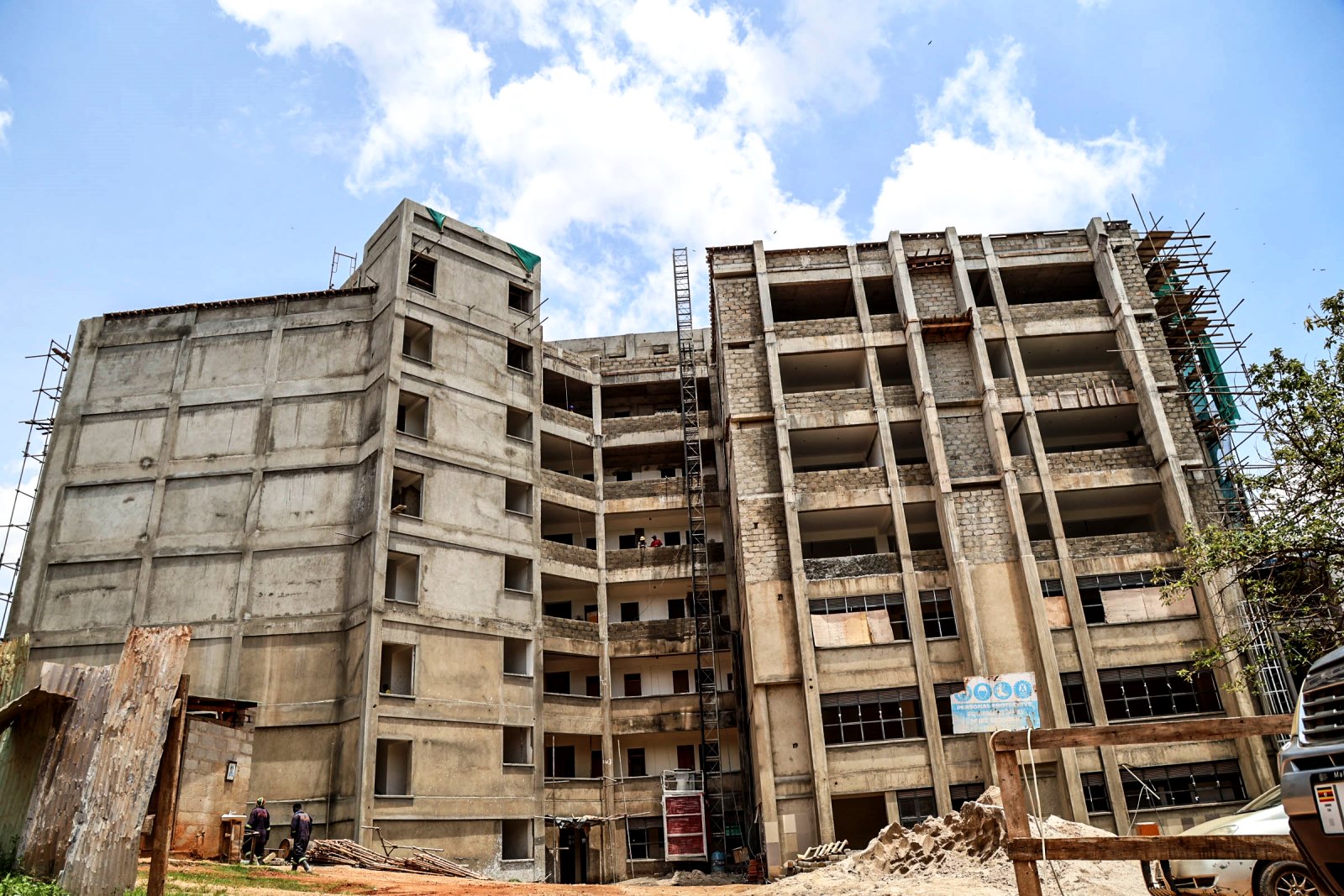 Side elevation of the Makerere University School of Public Health (MakSPH) Phase II complex under construction on the Main Campus. Construction of Phase II of the Makerere University School of Public Health (MakSPH) Complex, Eastern Gate, Main Campus, Kampala Uganda, East Africa.