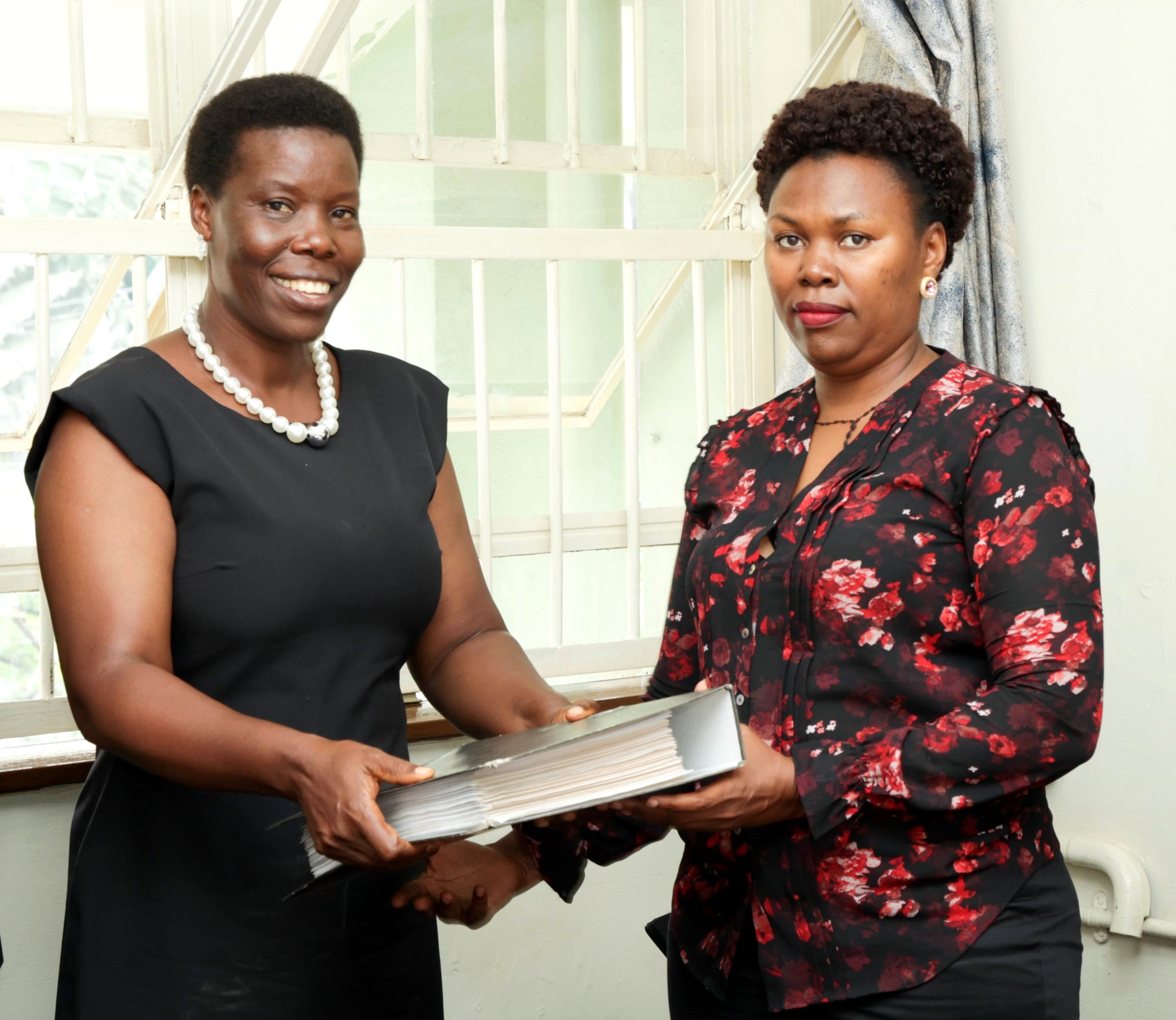 Ms. Gladys Khamili hands over to Ms. Annet Khabuya after 12 years of service as Registrar and transitions to senior role Deputy Registrar, Senate Division, Office of the Academic Registrar during the Makerere University School of Public Health (MakSPH) 239th Management Meeting, 15th April 2026, Mulago Campus, Kampala Uganda, East Africa.