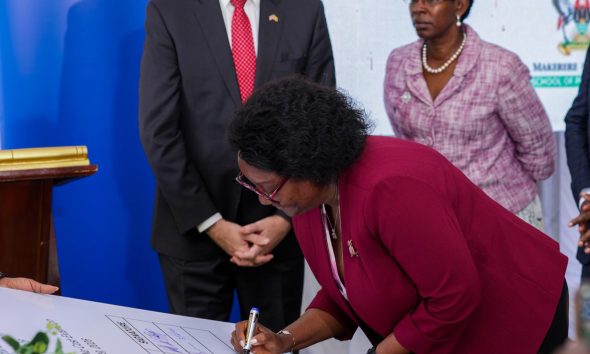 Prof. Rhoda Wanyenze, Dean of MakSPH and Principal Investigator of METS signs to transition the digital health systems and assets to the Ministry of Health on 31st March 2026. Transition of Uganda’s digital health systems and assets built over 15 years through the Makerere University School of Public Health Monitoring and Evaluation Technical Support (MakSPH-METS) Program with funding from the U.S. Government to the Ministry of Health (MoH), 31st March 2026, MoH Headquarters, Kampala Uganda, East Africa.