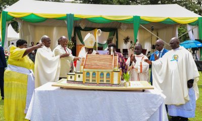 H.E. Maj. (Rtd) Jessica Alupo and His Grace Paul Ssemogerere flanked by Prof. Barnabas Nawangwe, Rev. Fr. Josephat Ddungu, clergy and other officials cuts cake at the thanksgiving Mass on 12th April 2026. Marking 85 years of St. Augustine Chapel under the theme, “Our hearts are restless until they rest in you, O Lord,” thanksgiving Mass led by His Grace, Paul Ssemogerere, Archbishop of the Roman Catholic Archdiocese of Kampala, and Chief Guest as Vice President H.E. Maj. (Rtd)  Jessica Alupo, April 12, 2026, Freedom Square, Makerere University, Kampala Uganda, East Africa.