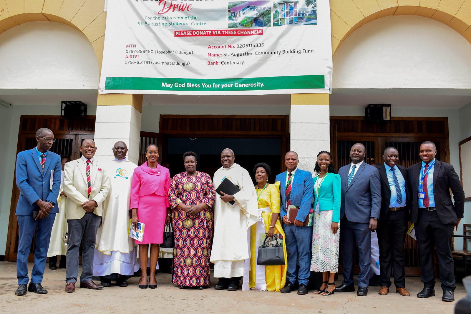 The Vice President H.E Jessica Alupo (5th L), with the Vice Chancellor-Prof. Barnabas Nawangwe (2nd L), the Chaplain Rev. Fr. Josephat Ddungu (6th L) pose for a commemorative photo with other University officials at St. Augustine Chapel ahead of the Holy Mass and the Fundraising Event for the expansion of the Student Centre. Marking 85 years of St. Augustine Chapel under the theme, “Our hearts are restless until they rest in you, O Lord,” thanksgiving Mass led by His Grace, Paul Ssemogerere, Archbishop of the Roman Catholic Archdiocese of Kampala, and Chief Guest as Vice President H.E. Maj. (Rtd)  Jessica Alupo, April 12, 2026, Freedom Square, Makerere University, Kampala Uganda, East Africa.
