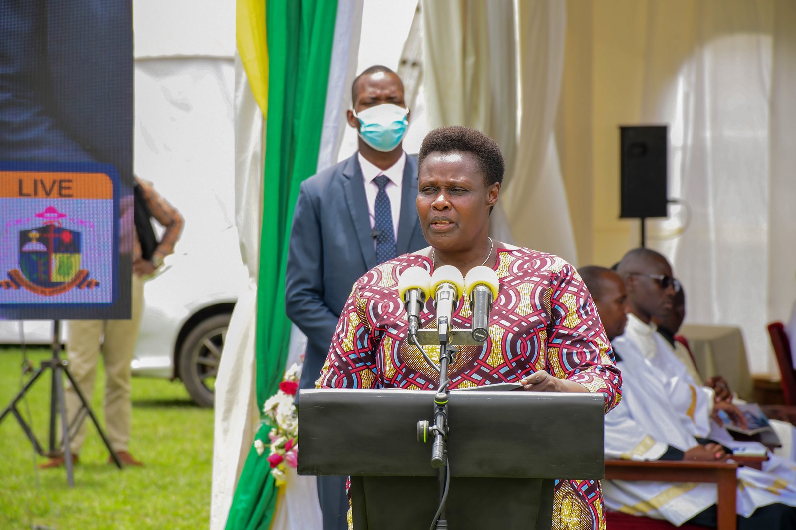 H.E. Maj. (Rtd) Jessica Alupo addresses the congregation. Marking 85 years of St. Augustine Chapel under the theme, “Our hearts are restless until they rest in you, O Lord,” thanksgiving Mass led by His Grace, Paul Ssemogerere, Archbishop of the Roman Catholic Archdiocese of Kampala, and Chief Guest as Vice President H.E. Maj. (Rtd)  Jessica Alupo, April 12, 2026, Freedom Square, Makerere University, Kampala Uganda, East Africa.