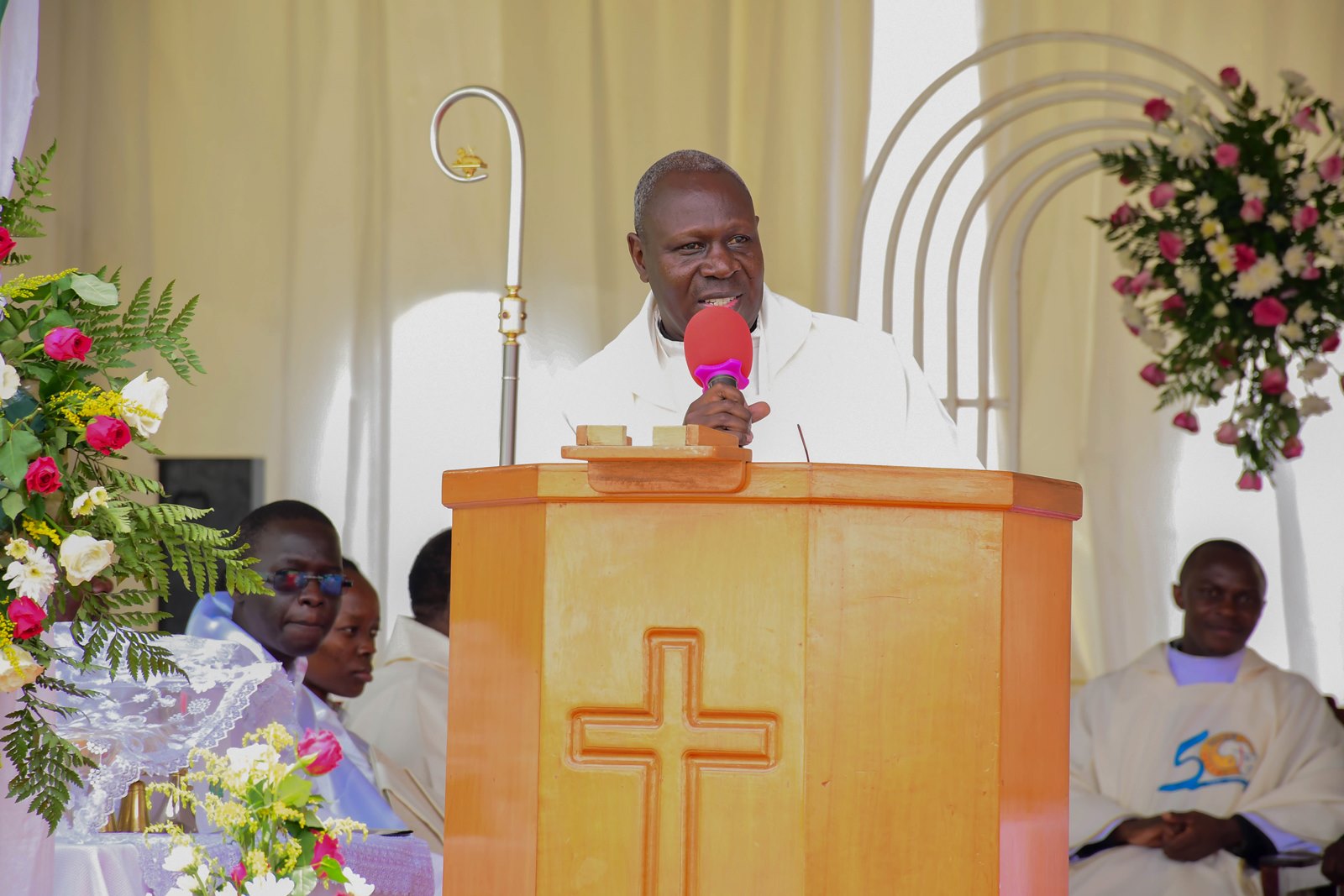 Rev. Fr. Josephat Ddungu. Marking 85 years of St. Augustine Chapel under the theme, “Our hearts are restless until they rest in you, O Lord,” thanksgiving Mass led by His Grace, Paul Ssemogerere, Archbishop of the Roman Catholic Archdiocese of Kampala, and Chief Guest as Vice President H.E. Maj. (Rtd)  Jessica Alupo, April 12, 2026, Freedom Square, Makerere University, Kampala Uganda, East Africa.