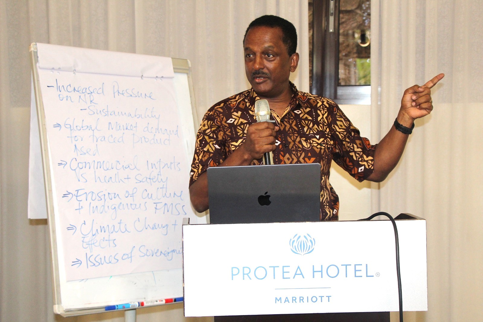 Million Belay, General Coordinator of the Alliance for Food Sovereignty in Africa (AFSA) addressing participants at the workshop. Makerere University College of Agricultural and Environmental Sciences (CAES), two-day Stakeholder Validation Workshop for the Agroecology Curriculum in East Africa, 5th and 6th May 2026, at Protea Hotel, Kampala Uganda.
