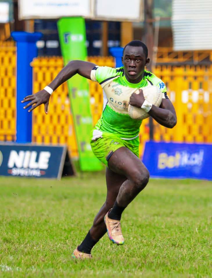 Lamot Magali, one of Impis' fast rising stars takes flight. From the Graveyard to the Semi-Finals: The Remarkable Rise of Makerere University's Impis Rugby Club, Kampala Uganda, East Africa.
