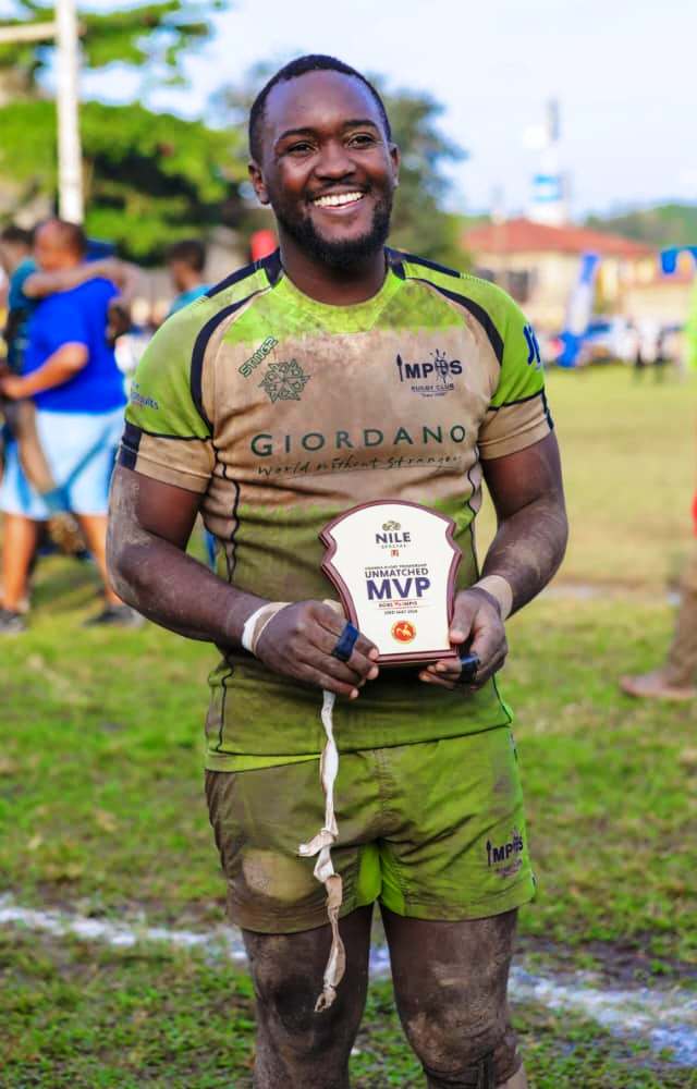 Pius Mpoza celebrates his 100th appearance for Impis with an MVP award on 23rd May 2026. From the Graveyard to the Semi-Finals: The Remarkable Rise of Makerere University's Impis Rugby Club, Kampala Uganda, East Africa.