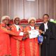 L-R: The presiding judges - Hon Justice Isa Serunkuma, Hon. Lady Justice Jane Okuo Kajuga, Hon Lady Justice Alice Komuhangi Khauka with Mayanja Owen who was named the best oralist at the moot competition. Public Interest Law (PILAC) 13th Clinical Legal Education (CLE) Moot presided over by a panel of three High Court Judges: Hon. Lady Justice Jane Okuo Kajuga, Hon. Justice Isa Serunkuma and Hon. Lady Justice Alice Komuhangi Khaukha, 14th May 2026, in the Makerere University School of Law (SoL) Moot Court Room, Kampala Uganda, East Africa.
