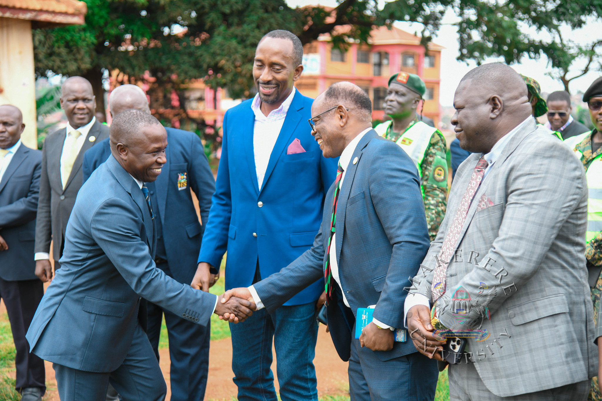 Hon. Peter Ogwang is received by Prof. Barnabas Nawangwe and other officials upon arrival. Groundbreaking ceremony for the AFCON 2027 training facilities at Makerere University and commissioning of six construction sites in Hoima, Masindi, Kyambogo University, Lira University, and Gulu University, 19th February 2026, Main Sports Grounds, Kampala Uganda, East Africa.