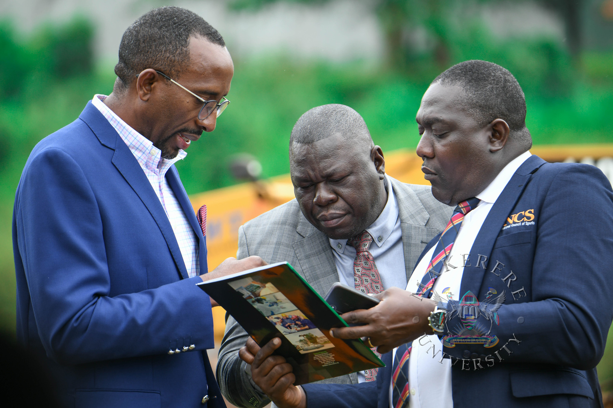 L-R: National Council of Sports (NCS)' Mr. Ambrose Tashobya, Dr. Bernard Ogwel and Mr. Mark Ssali. Groundbreaking ceremony for the AFCON 2027 training facilities at Makerere University and commissioning of six construction sites in Hoima, Masindi, Kyambogo University, Lira University, and Gulu University, 19th February 2026, Main Sports Grounds, Kampala Uganda, East Africa.