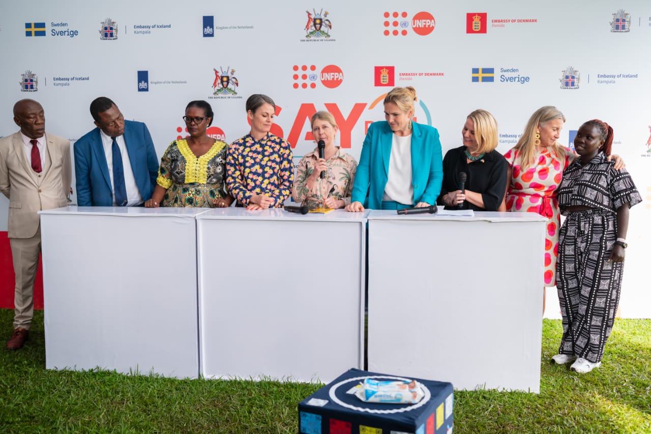 L-R: Prof. Henry Alinaitwe, Dr. Charles Olaro, Hon. Margaret Muhanga, Amb. Signe Winding Albjerg, Amb. Maria Håkansson, Amb. Frederieke Quispel, Amb. Unnur Orradottir Ramette, Ms. Kristine Blokhus and a young lady during the press interviews. The Government of Uganda, through the Ministry of Health officially launches the SAY Plus+ Programme, a Sexual and Reproductive Health and Rights (SRHR) initiative designed to strengthen adolescent and youth rights, empowerment, protection and access to quality services in Uganda's underserved regions, Backed by a USD 50 million pooled fund from the Governments of Iceland, Denmark, the Netherlands, and Sweden, scheduled to operate between 2024 and 2030. 7th May 2026, Freedom Square, Makerere University, Kampala Uganda, East Africa.