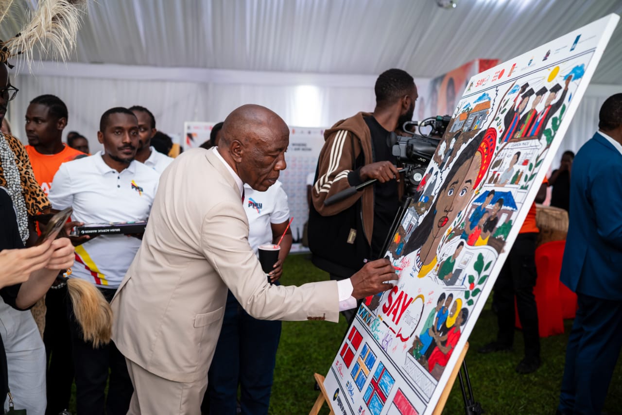 Prof. Henry Alinaitwe signs the commemorative piece. The Government of Uganda, through the Ministry of Health officially launches the SAY Plus+ Programme, a Sexual and Reproductive Health and Rights (SRHR) initiative designed to strengthen adolescent and youth rights, empowerment, protection and access to quality services in Uganda's underserved regions, Backed by a USD 50 million pooled fund from the Governments of Iceland, Denmark, the Netherlands, and Sweden, scheduled to operate between 2024 and 2030. 7th May 2026, Freedom Square, Makerere University, Kampala Uganda, East Africa.
