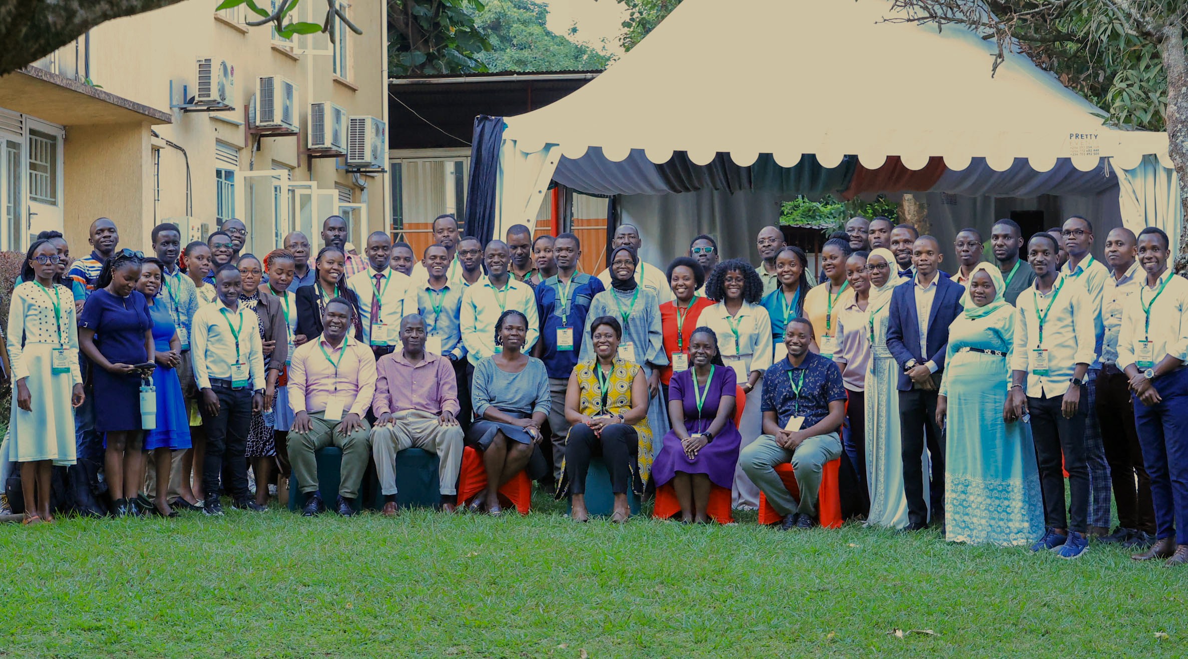 Officials pose for a group photo with participants in the specialized short course on Artificial Intelligence (AI) and Machine Learning (ML) focused on their application in tuberculosis (TB) research, held from June 23–27, 2025, ResilientAfrica Network (RAN), Kololo MakSPH Annex. Makerere University School of Public Health, Kampala Uganda, East Africa.