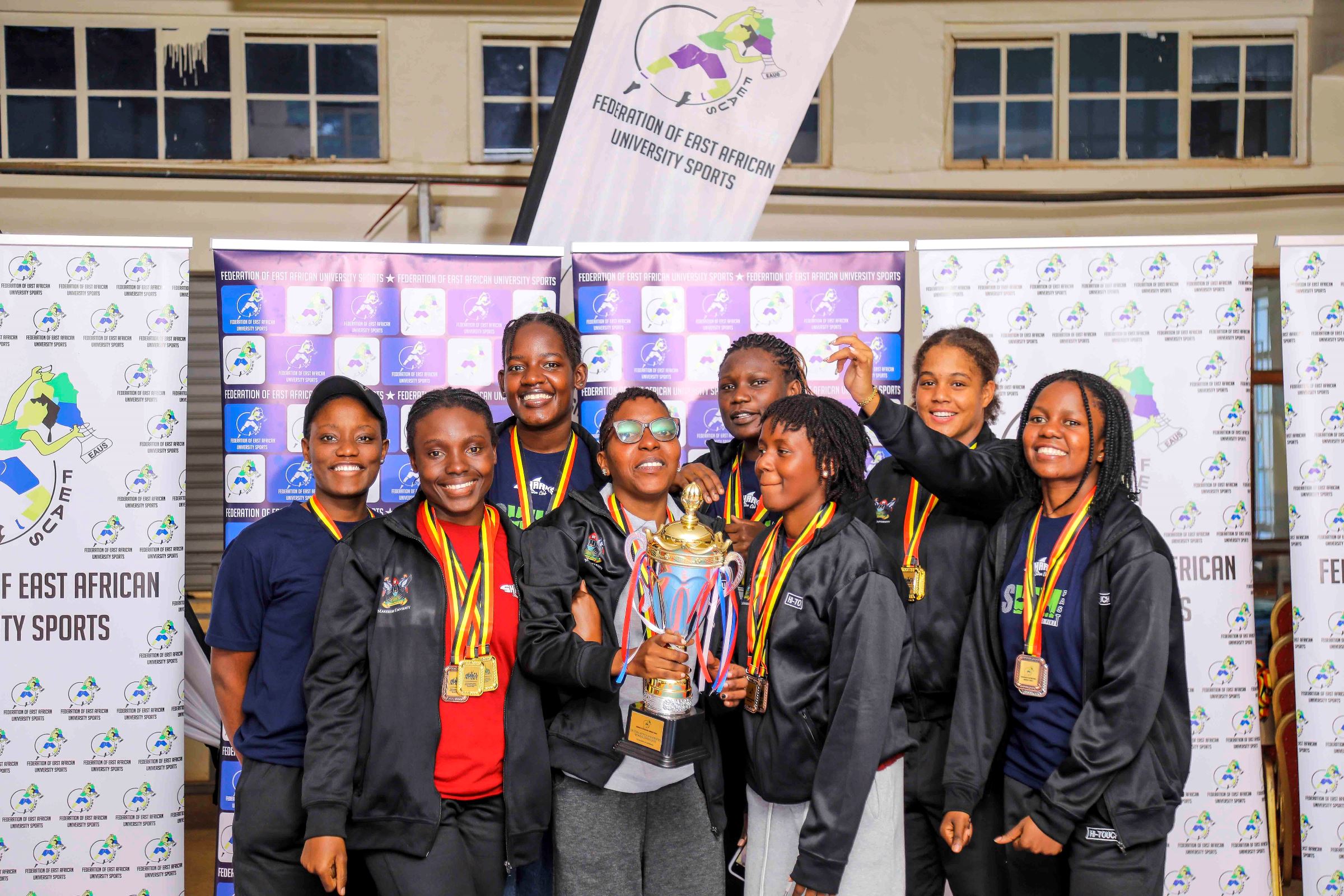 Mak Sharks Ladies that took part in the 5th FEAUS Women Games and 2nd PWD Games held March 20th–22nd, 2026, at Masinde Muliro University of Science and Technology (MMUST) in Kakamega, Kenya show off their trophy. Making Waves: The Rise of the Mak Sharks and Makerere University's Aquatic Legacy, Swimming, Kampala Uganda, East Africa.