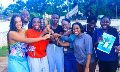 Mr. Brian Miiro (Background) with CCE/Complex Hall Swimmers that emerged Overall Winners in the girls' category at the Inter-Hall Swimming Championships held 17th April 2026. The Inter-Hall Swimming Championships, 17th April 2026, Makerere University Pool, Kampala Uganda, East Africa. Photos: Patrick Kawaii Instagram/WabwireJr