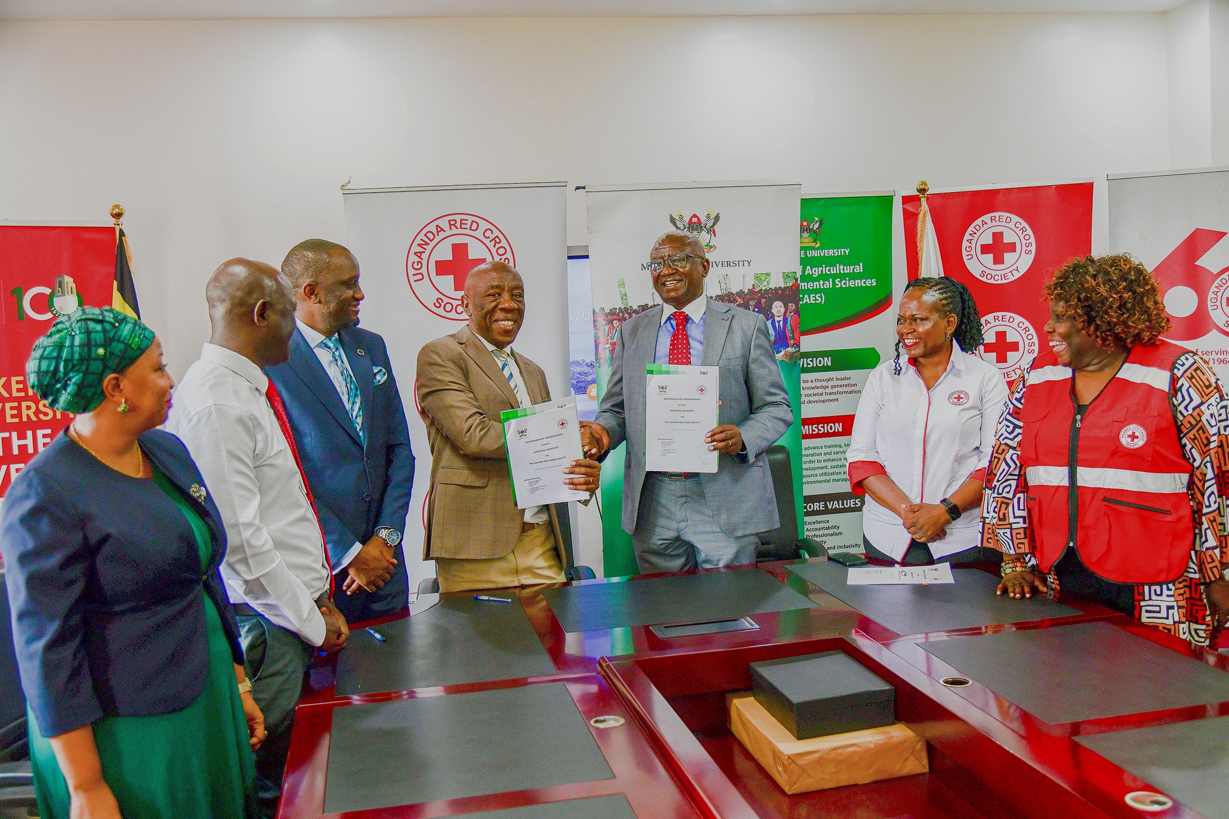 Makerere University DVCFA, Prof. Henry Alinaitwe, and Uganda Red Cross Society Secretary General, Mr. Robert Kwesigwa endorsed the MoU. Makerere University and Uganda Red Cross Society (URCS) sign Memorandum of Understanding (MoU) aimed at strengthening collaboration in research, training, innovation, and humanitarian service delivery, 19th May 2026, Main Building, Kampala, East Africa.