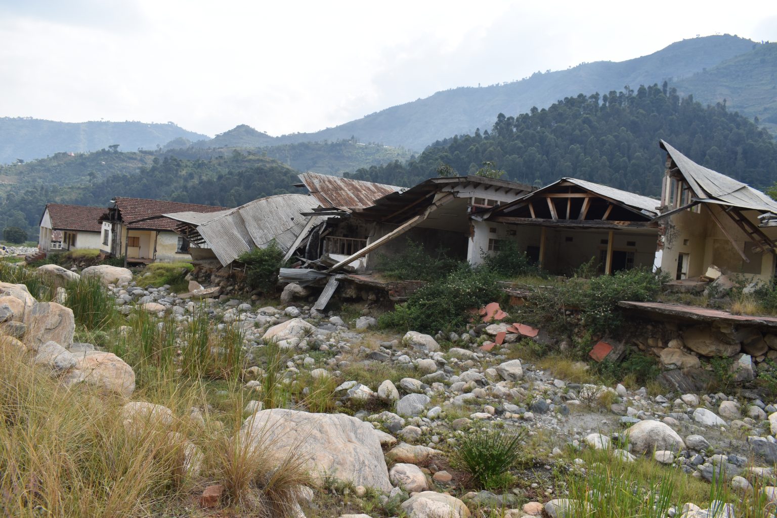 Section of houses which were destroyed by river Nyamwamba floods in Kasese district. The Communities of Hosts and Refugees Transitioning to Climate Resilience (CHART-CR) through workshops project focused on the interlinked dimensions of climate variability, food security, livelihoods, and water availability across diverse ecological contexts, including lowland refugee-hosting areas and mountainous, flood-prone regions through collaborative partnership between Makerere University Kampala Uganda, East Africa, University of Cambridge, and Cambridge-Africa Programme, with financial support from the Mastercard Foundation and Cambridge-Africa.