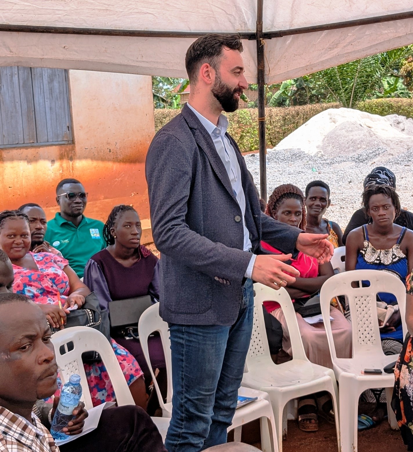 Mr. Andreas Bauer, from BOKU University sharing collaborative research in line with the TORCH project across East Africa. Towards a Clean Energy and Zero-Emission Society in East Africa: Strengthening Academic and Community Collaboration in Outreach, Training, and Research for Green Growth and a Healthy Environment (TORCH) Project Living Lab model project engagement, 4th May 2026 in Kawumu Village, Luwero District Uganda, East Africa with participation from Makerere University, BOKU University (Austria), Kabale University, academia, local communities, civil society, and international institutions.
