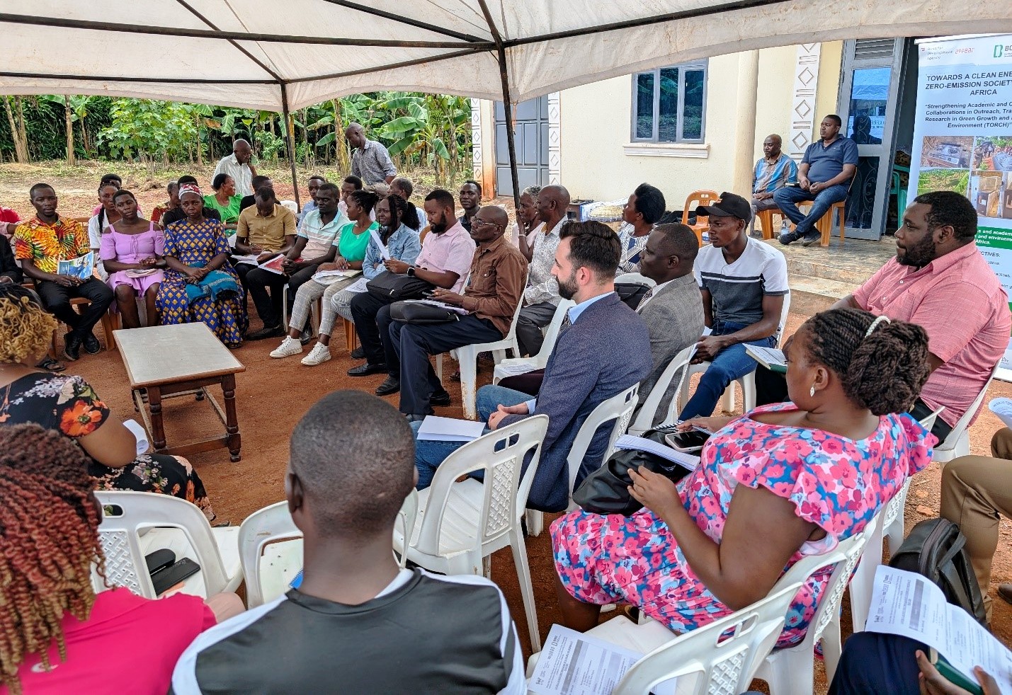 Round table discussion with stakeholders at the Living Lab in Luwero. Towards a Clean Energy and Zero-Emission Society in East Africa: Strengthening Academic and Community Collaboration in Outreach, Training, and Research for Green Growth and a Healthy Environment (TORCH) Project Living Lab model project engagement, 4th May 2026 in Kawumu Village, Luwero District Uganda, East Africa with participation from Makerere University, BOKU University (Austria), Kabale University, academia, local communities, civil society, and international institutions.