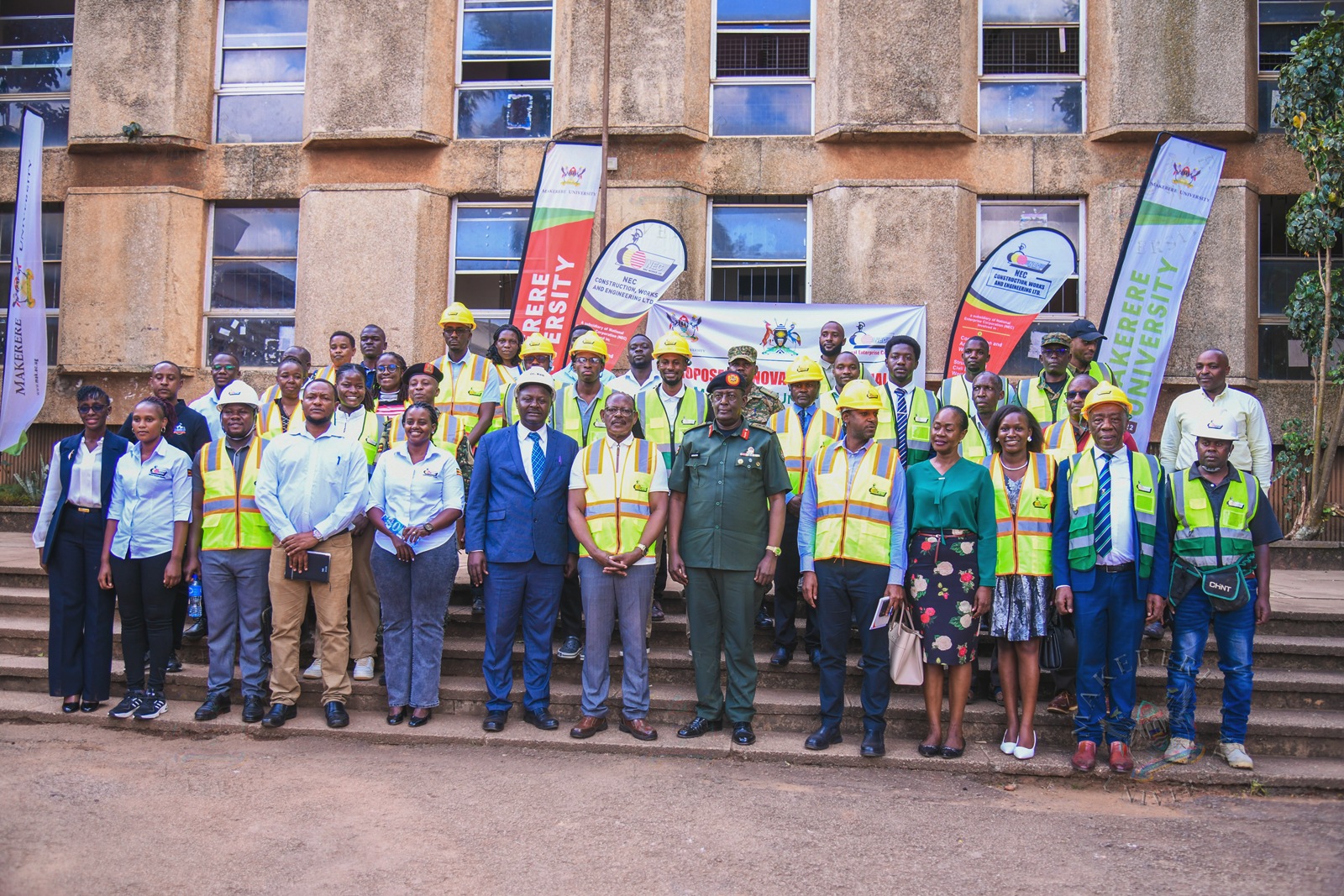 Stakeholders pose for a group photo after the event. Vice Chancellor, Prof. Barnabas Nawangwe hands over CCE (Complex) Hall of Residence Site to National Enterprise Corporation (NEC) Managing Director and CEO, Lt. Gen. James Mugira for renovation and overhaul works, Friday, 26th June 2026, Makerere University, Kampala Uganda, East Africa.