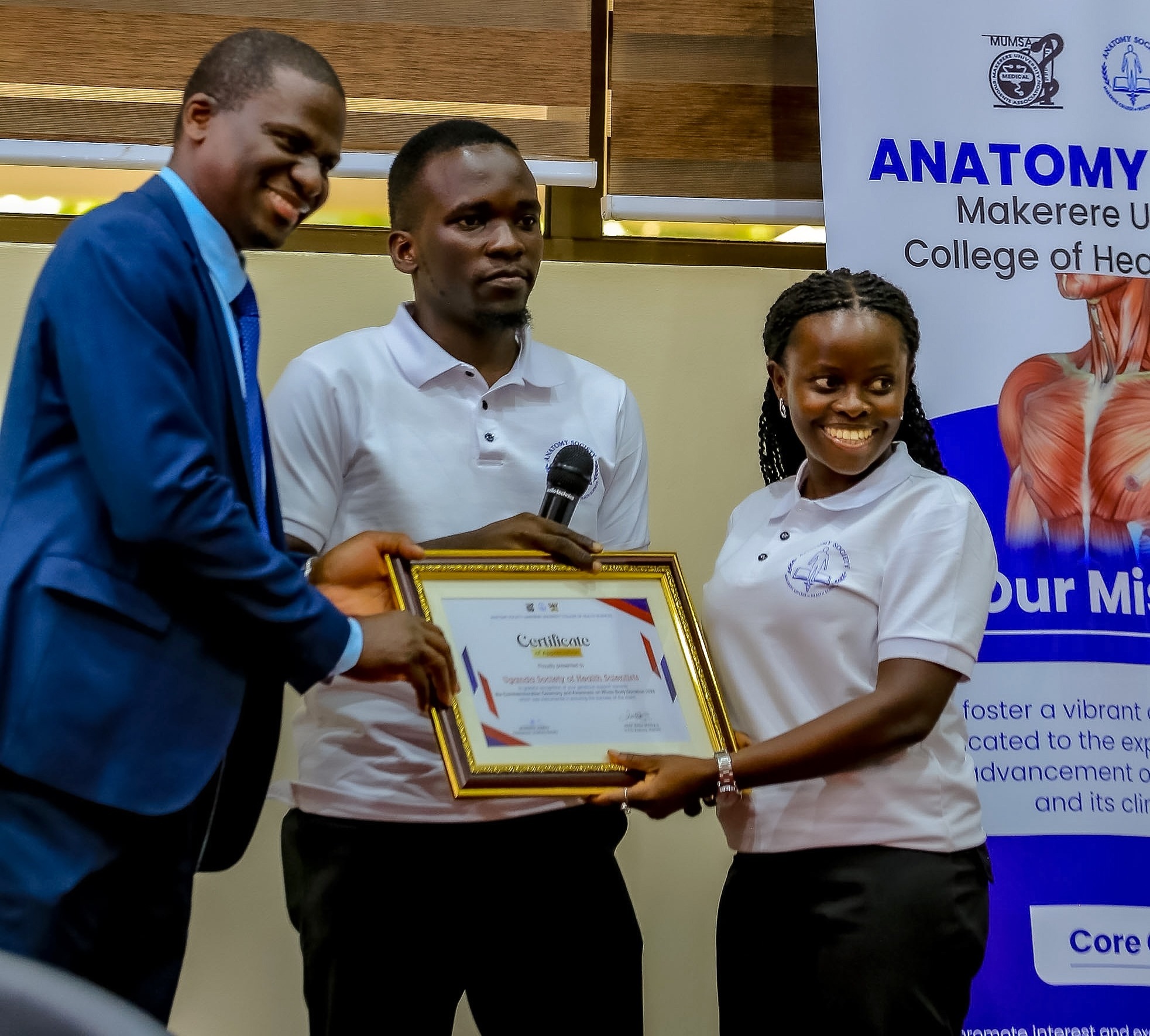 Prof. Mwaka presents one of the awards. Second Cadaver Commemoration Ceremony organized by the Makerere Students' Anatomy Society under the Department of Anatomy, College of Health Sciences (CHS) on June 11, 2026 at Makerere University School of Public Health Auditorium, Main Campus, Eastern Gate, Kampala Uganda, East Africa.