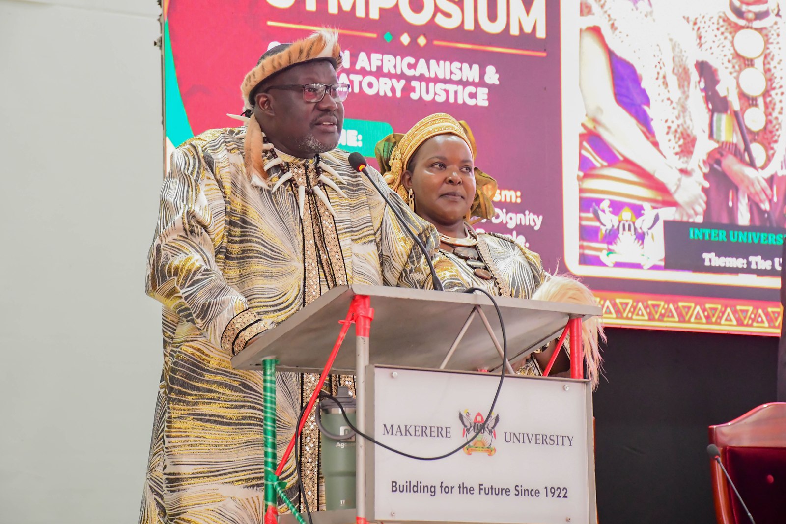 His Highness Papa, Dr Paul Jones Eganda (L) and Her Highness Dr Queen Grace Eganda (R). Inter-University Symposium on Pan-Africanism and Reparatory Justice held ahead 21st May 2025 of the Africa Day Celebrations with over 23 participating Universities, Main Hall, Makerere University, Kampala Uganda, East Africa.