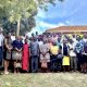 Study participants join Principal Investigator Professor Peter Baguma, members of the research team and officials from the Ministry of Health's Department of Mental Health and Control of Substance Abuse for a group photo after the dissemination workshop on 16th June 2026. Physiology Lecture Theatre at the College of Health Sciences, Mulago Hospital Complex, Makerere University, Kampala Uganda, East Africa.