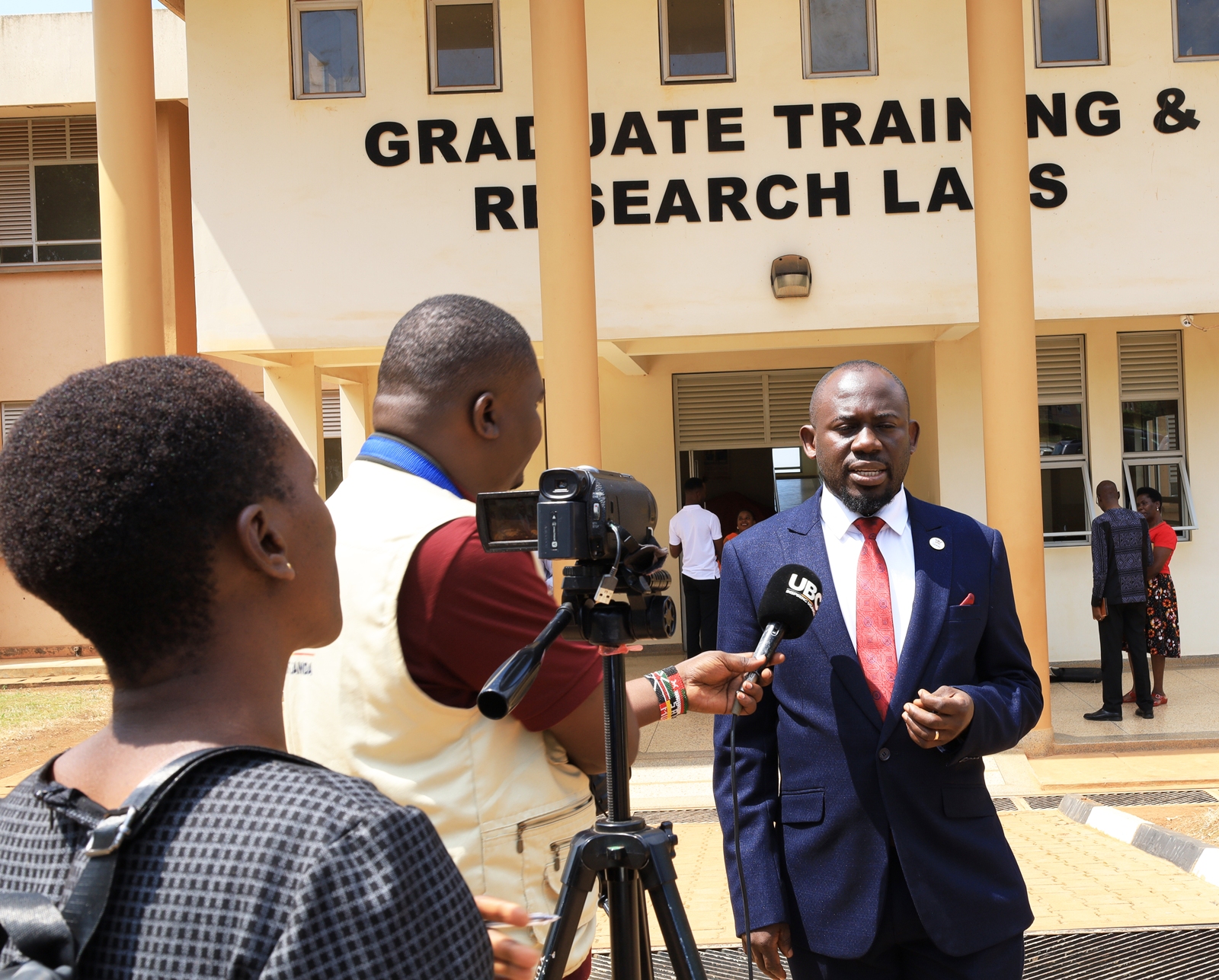 Dr. Peter Babyenda speaking to journalists after graduation. Makerere University Environment for Development Initiative (EfD- Mak Centre) graduation of five senior government officials under the 2025 Inclusive Green Economy (IGE) Fellowship Programme, equipping them with advanced knowledge and skills to champion climate-smart agriculture (CSA) and sustainable development in Uganda, June 25, 2026, Makerere University Agricultural Research Institute, Kabanyolo (MUARIK), Wakiso, East Africa.