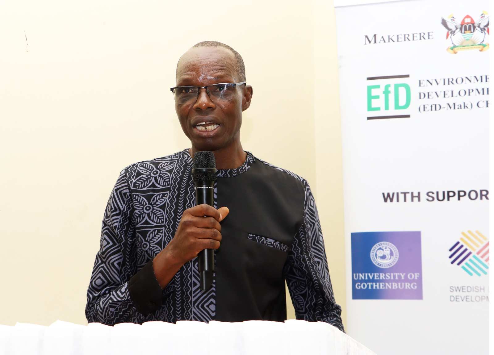 Dr. Peter Ebanyat, the Director of MUARIK makes remarks during the ceremony. Makerere University Environment for Development Initiative (EfD- Mak Centre) graduation of five senior government officials under the 2025 Inclusive Green Economy (IGE) Fellowship Programme, equipping them with advanced knowledge and skills to champion climate-smart agriculture (CSA) and sustainable development in Uganda, June 25, 2026, Makerere University Agricultural Research Institute, Kabanyolo (MUARIK), Wakiso, East Africa.