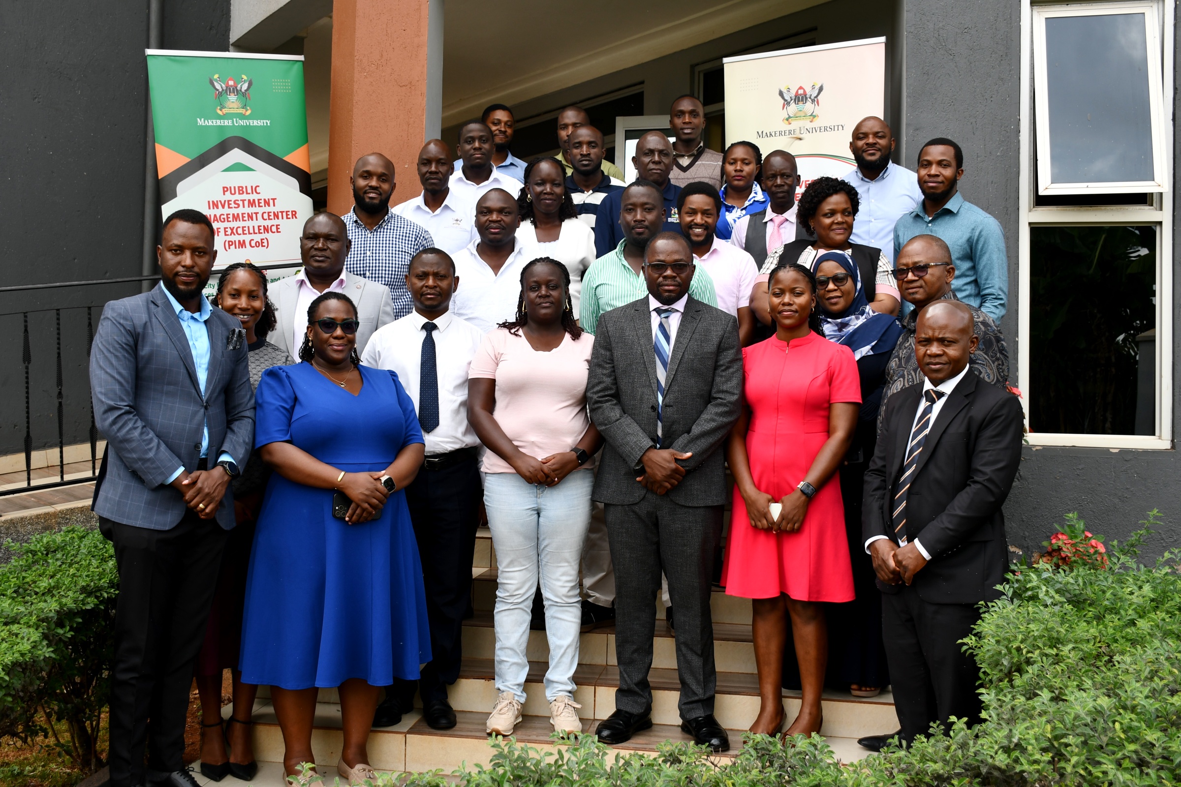 Prof. Ibrahim Mike Okumu (C) with stakeholders and participants at the commencement of the two-week training in Jinja on 22nd June 2026. Public Investment Management Centre of Excellence (PIM CoE), Makerere University, Kampala in partnership with the Ministry of Finance, Planning and Economic Development (MoFPED) commencement of two-week training of the fourth cohort of the Capacity Enhancement and Hands-on Training on the Guidelines for Financial Clearance and the Certificate of Financial Implications (CFI) – Integrated Regulatory Cost-Benefit Analysis. 22nd June 2026, Pearl on the Nile Hotel, Jinja, Uganda, East Africa.