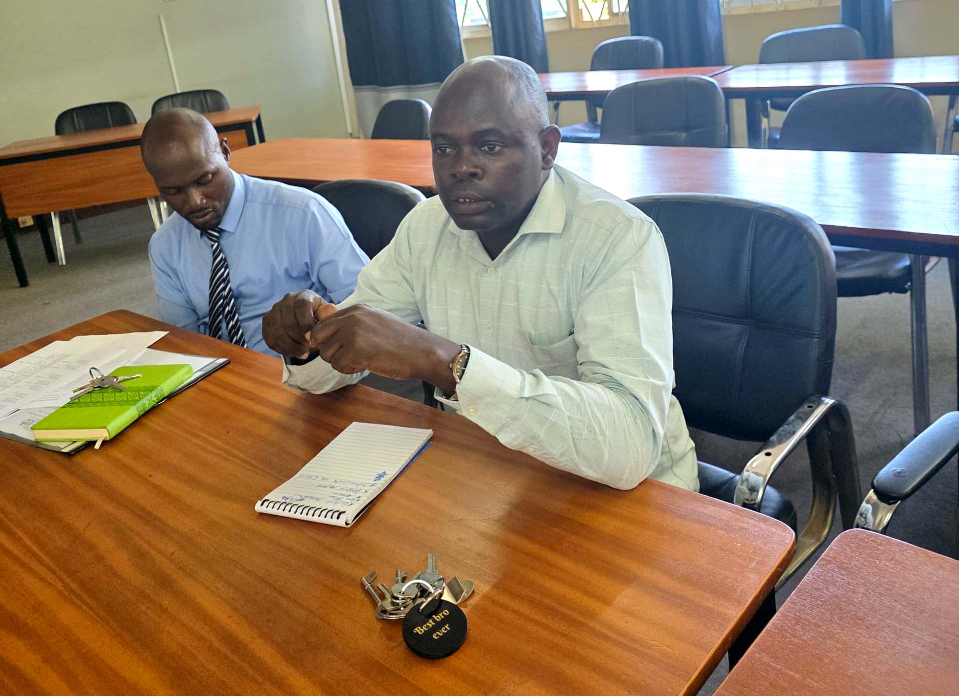 Mr. Phillip Mawejje (R) and Dr. Nestor Mugabe (L). Directorate of Graduate Training launches thesis completion grant aimed at supporting PhD students to complete their research, improve completion rates, and align academic work with Uganda’s national development priorities, 8th June, 2026, Telepresence Hall, Senate Building, Makerere University, Kampala, East Africa.