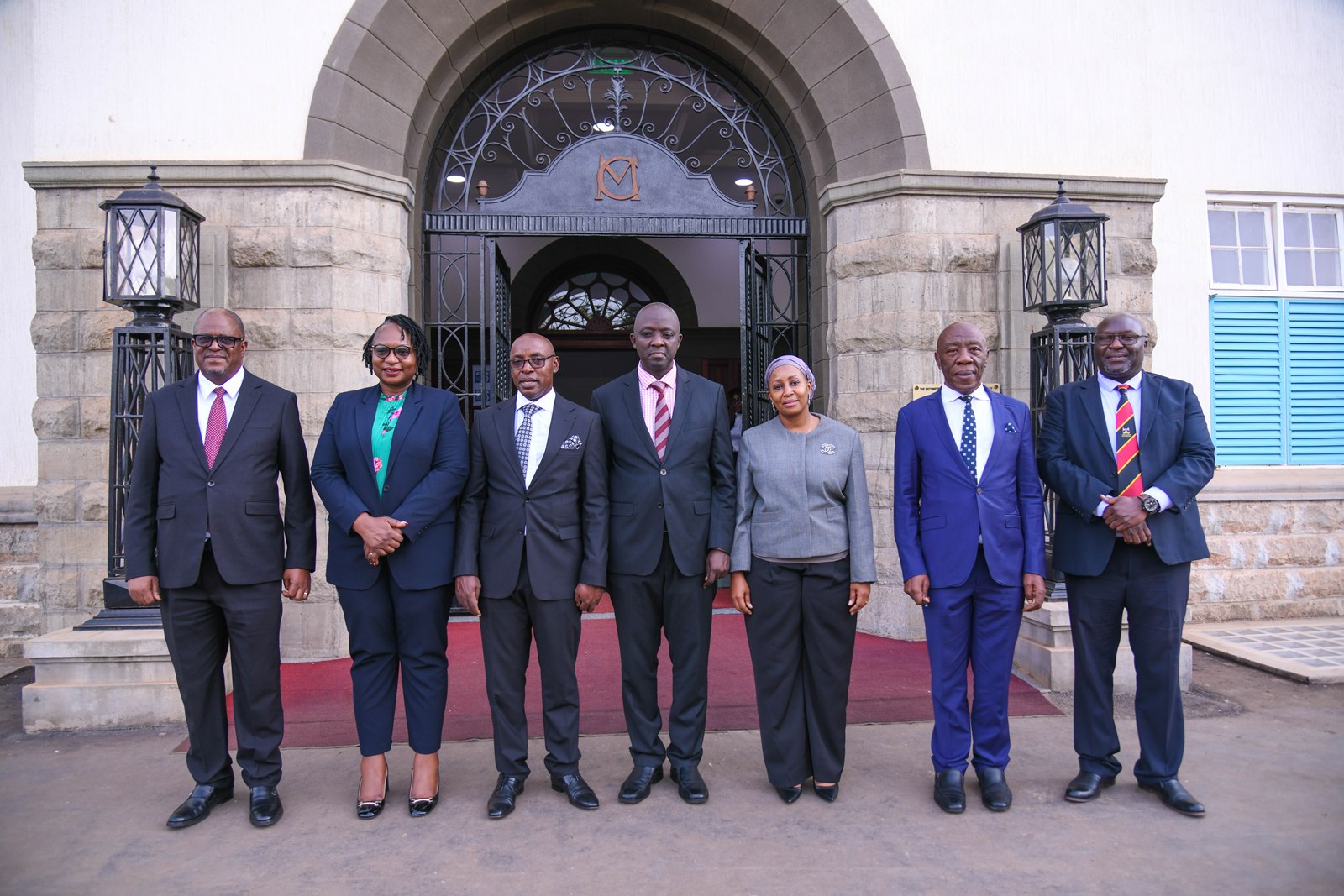 Prof. Henry Alinaitwe (2nd R) poses for a group photo with the dignitaries at the Main Building Entrance. Courtesy Visit of the Chief Justice of the Republic of Zambia, Hon. Justice Dr. Mumba Malila and the Chief Justice of Uganda, Hon. Justice Dr. Flavian Zeija on sidelines of the African Chief Justices' Forum on Alternative Dispute Resolution (ADR) leadership handover ceremony, 16th June 2026, Makerere University, Kampala Uganda.