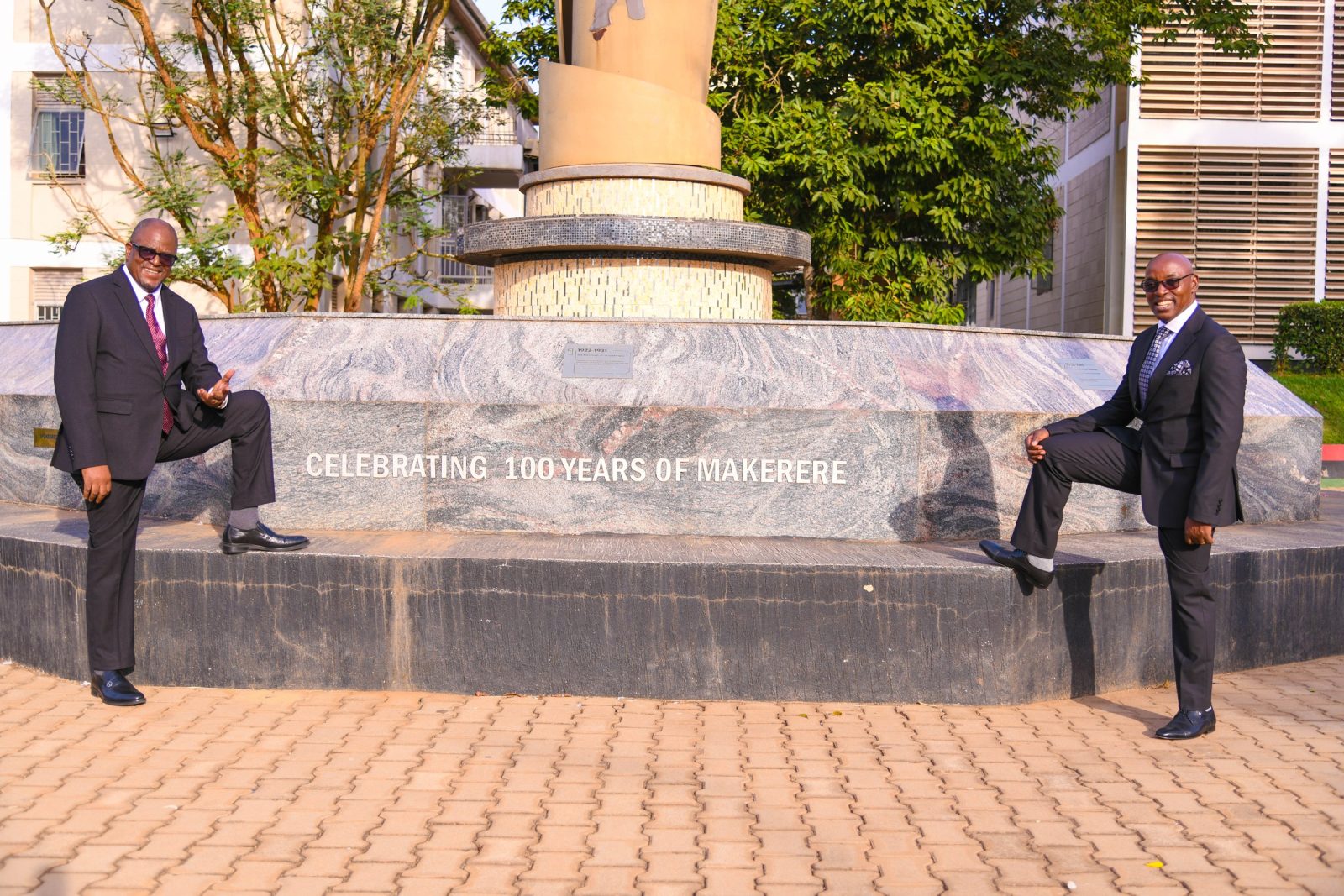 Hon. Justice Dr. Mumba Malila (L) and Hon. Justice Dr. Flavian Zeija enjoy a warm moment at the Makerere@100 Monument on 15th June 2026, Makerere University, Kampala Uganda, East Africa. Courtesy Visit of the Chief Justice of the Republic of Zambia, Hon. Justice Dr. Mumba Malila and the Chief Justice of Uganda, Hon. Justice Dr. Flavian Zeija on sidelines of the African Chief Justices' Forum on Alternative Dispute Resolution (ADR) leadership handover ceremony, 16th June 2026, Makerere University, Kampala Uganda.