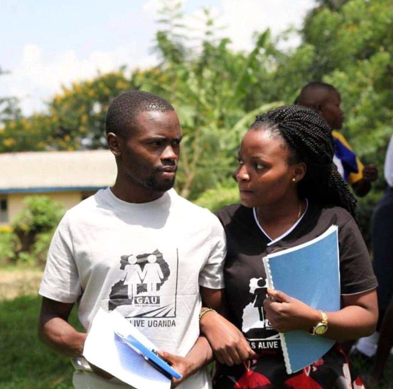 Sylas Ruhweza and Marion Apio at one of the Girls Alive Uganda (GAU) outreaches.