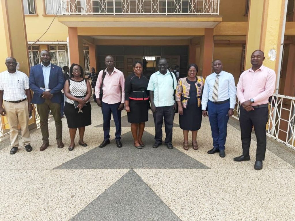 A group photo with the delegation at the Senate Building entrance. Makerere University, Kampala Uganda, East Africa.