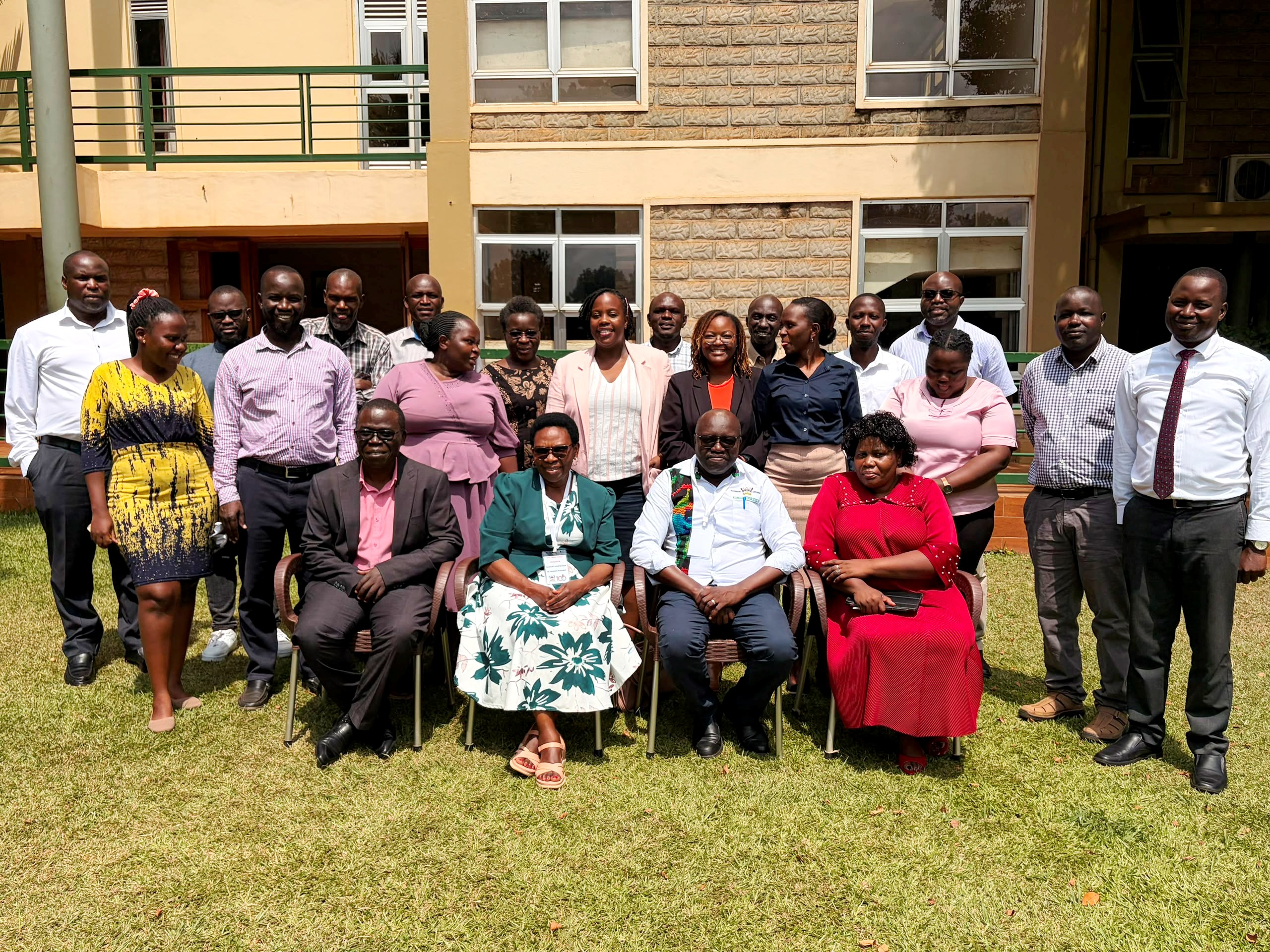 Seated L-R: Dr. Peter Ssenkusu, Prof Grace Ndeezi, Prof Idro Richard and Dr. Irene Rebecca Namatende with the participants at Esella Country Hotel. Makerere University College of Health Sciences (MakCHS) Quality Assurance (QA) Training in Assessments, Pedagogy and Competence Based Curriculum Held 18–19 June 2026 at Esella Hotel, Waksio, Uganda, East Africa.