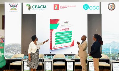 Hon. Beatrice Atim Anywar (Left), Uganda's Minister of State for Environment, unveils the CEACM policy briefs at Makerere University as Prof. Edward Bbaale, CEACM Director, looks on. Launch of Policy Briefs developed by the Centre of Excellence for Africa Climate-Sensitive Macroeconomic Modelling (CEACM), College of Business and Management Sciences (CoBAMS), 15th July 2026, Senior Common Room, Main Building, Makerere University, Kampala Uganda, East Africa.